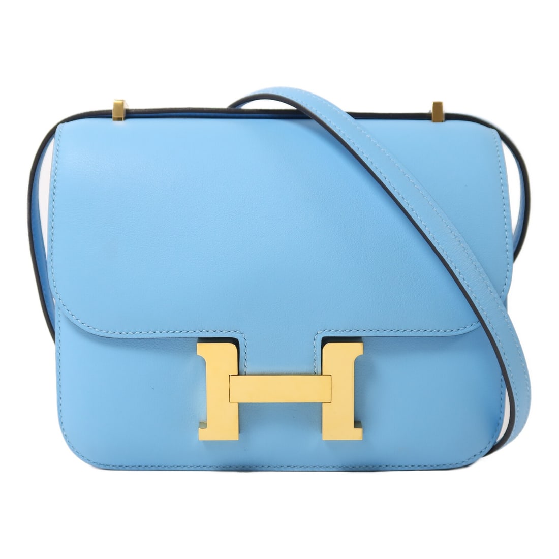 Hermes Constance Mini Celeste Swift Leather Shoulder Bag GHW: Hermes Constance Mini Celeste Swift Leather Shoulder Bag GHW This Hermes Constance Mini shoulder bag is crafted from Veau Swift calfskin leather in a striking blue color. Designed for women, it featur