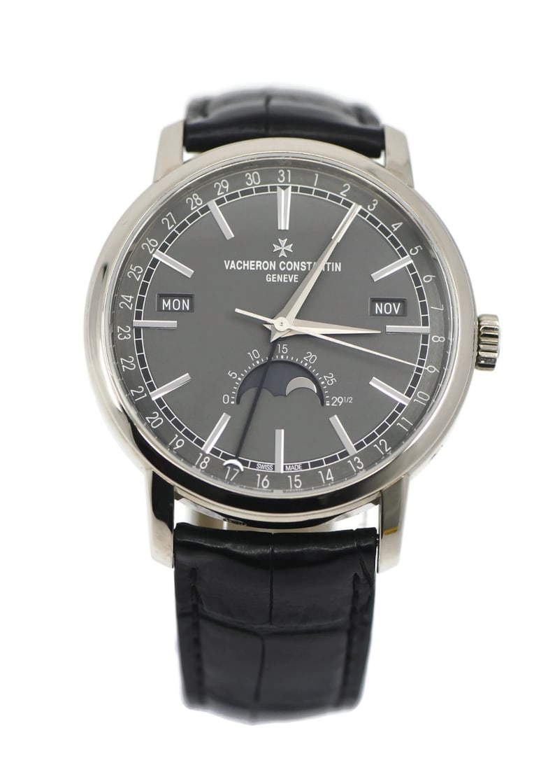 Traditionnelle 4010T Automatic Wristwatch in 18K White Gold with Box and Papers: Traditionnelle 4010T Automatic Wristwatch in 18K White Gold with Box and Papers This Vacheron Constantin Traditionnelle wristwatch features an 18K white gold case and a classic leather band. The watch