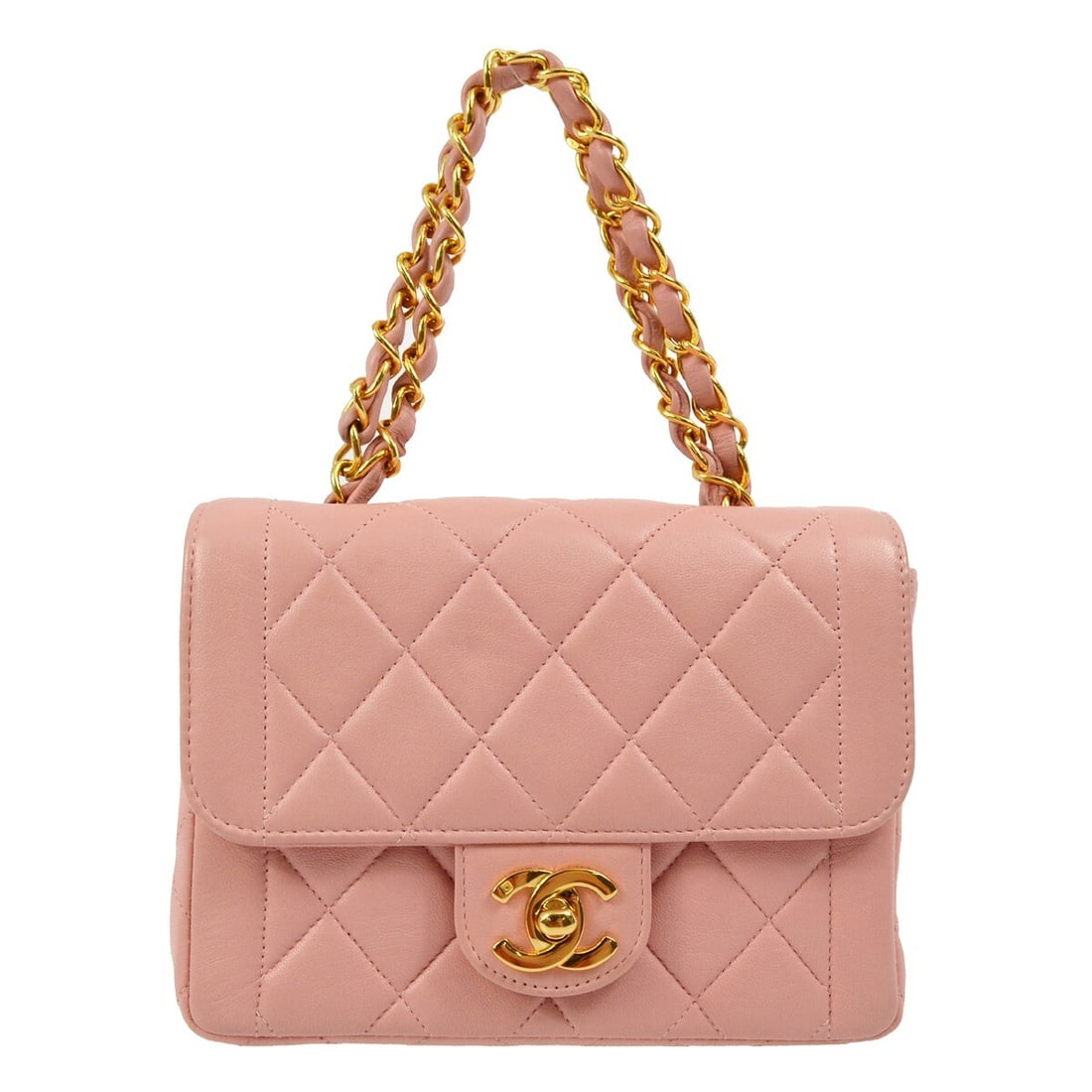 Chanel Navy Lambskin Top Handle Handbag Quilted Design: Chanel Navy Lambskin Top Handle Handbag Quilted Design This exquisite Chanel handbag is crafted from luxurious lambskin leather, featuring a chic navy exterior complemented by a soft pink handle. Desi