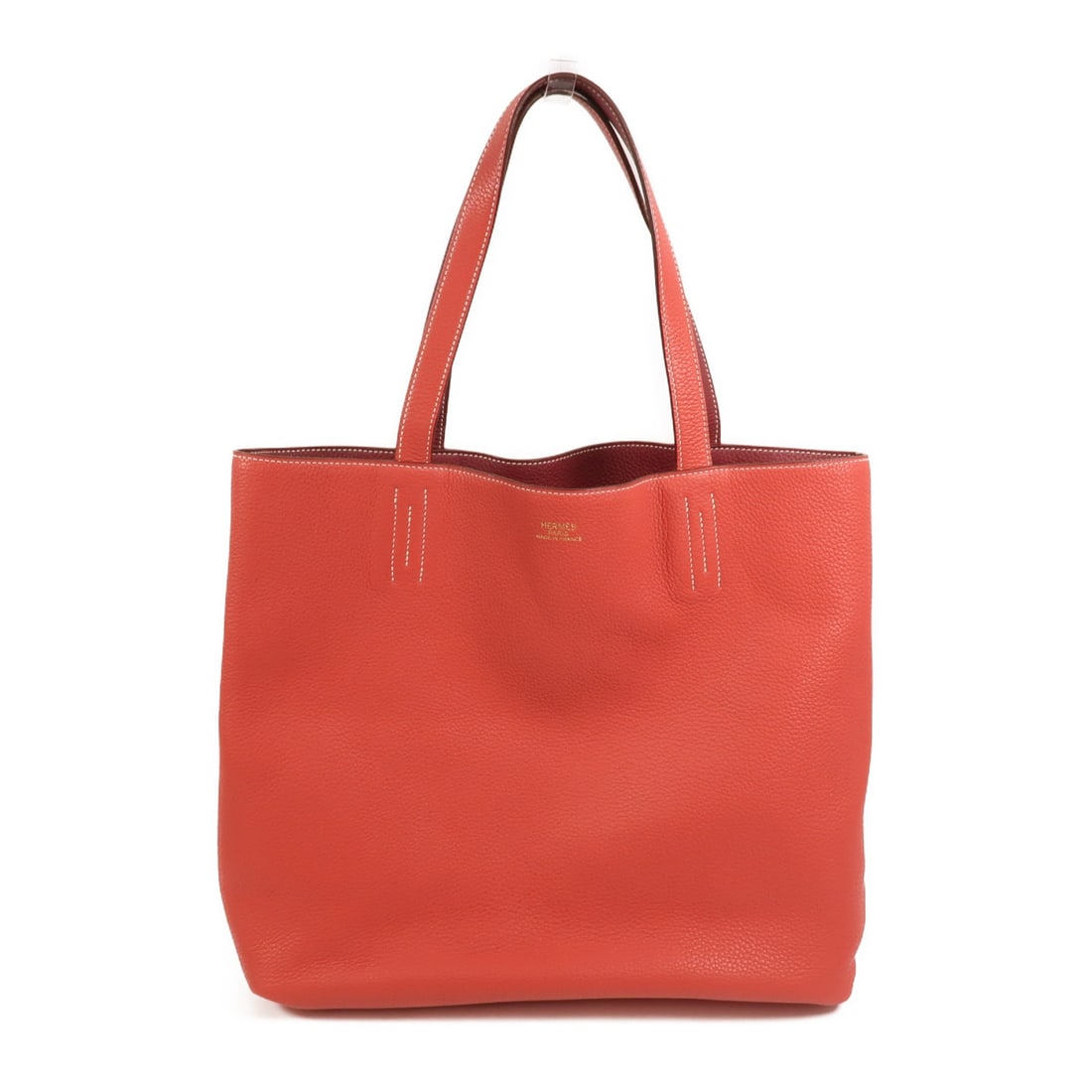 HERMES Double Sens 36 Red Taurillon Clemence Leather Tote Bag: HERMES Double Sens 36 Red Taurillon Clemence Leather Tote Bag This Hermes Double Sens 36 tote bag is crafted from high-quality calfskin leather in a striking red hue. Designed for women, it features a