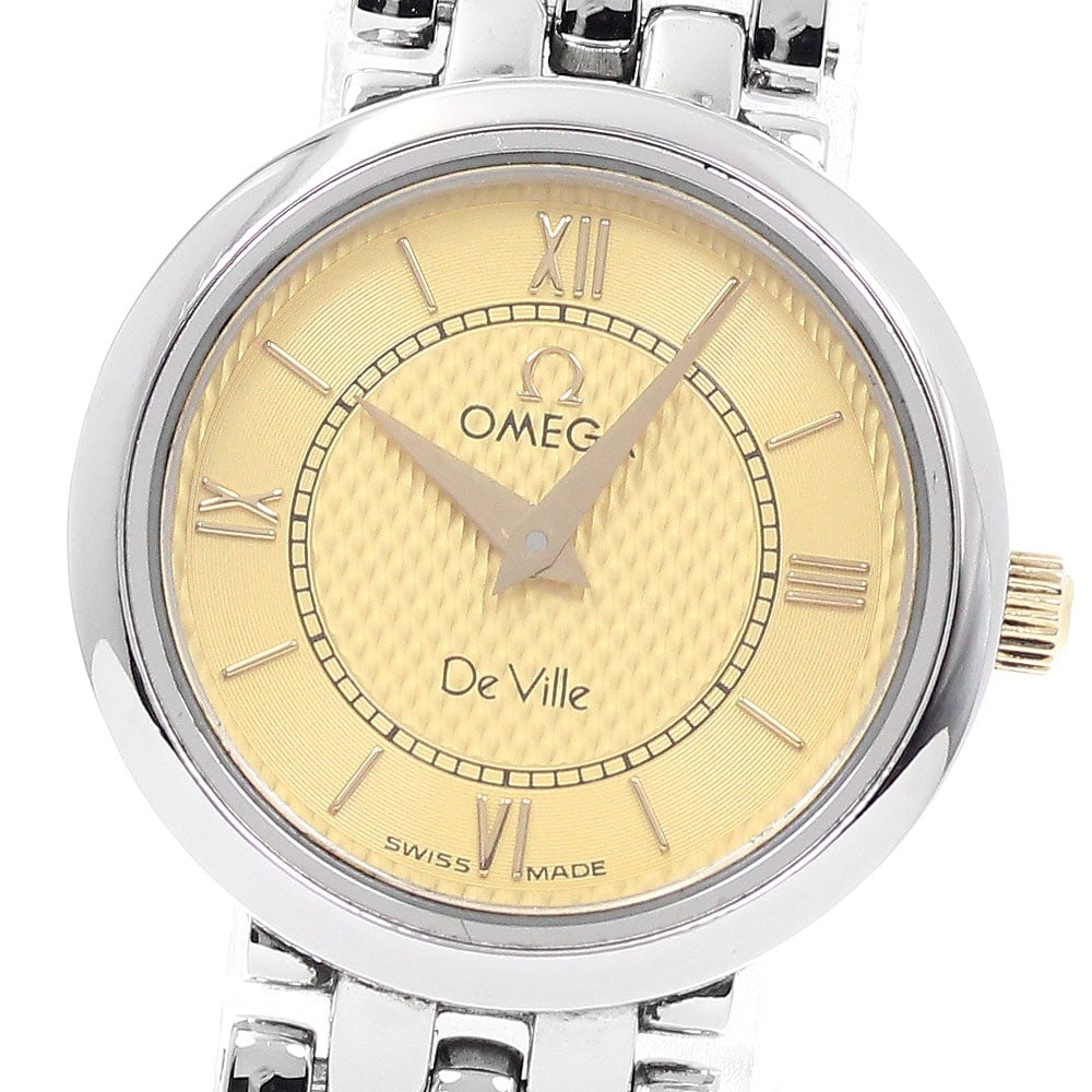 Omega De Ville Prestige Quartz Womens Stainless Steel Watch: Omega De Ville Prestige Quartz Womens Stainless Steel Watch This OMEGA De Ville Prestige Quartz women's wristwatch features a stainless steel case and bracelet with a gold-colored dial. The watch oper