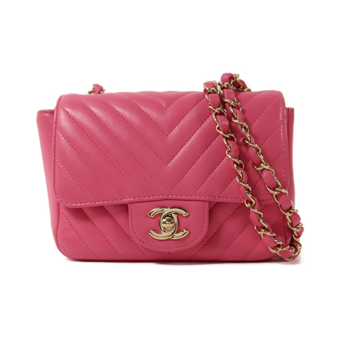 Chanel Mini Classic Pink Lambskin Shoulder Bag with CC Gold Hardware: Chanel Mini Classic Pink Lambskin Shoulder Bag with CC Gold Hardware This CHANEL Mini Classic 17 shoulder bag features a pink lambskin leather exterior and gold-tone hardware. Designed for women, this
