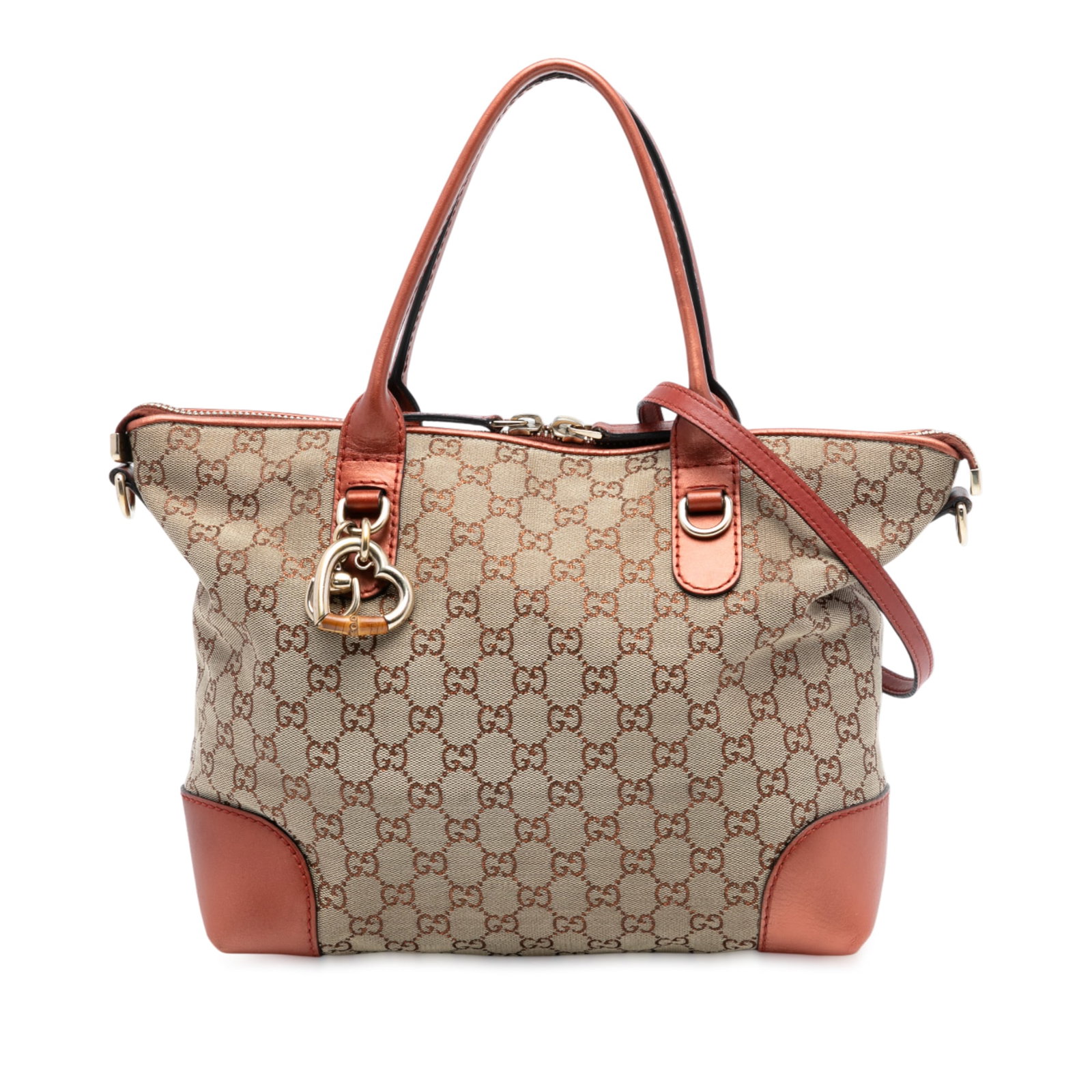 Gucci beige canvas satchel with heart bit detail and leather trim: Gucci beige canvas satchel with heart bit detail and leather trim The Gucci GG Canvas Heart Bit Satchel features a beige canvas body accented with leather trim, flat leather handles, and a