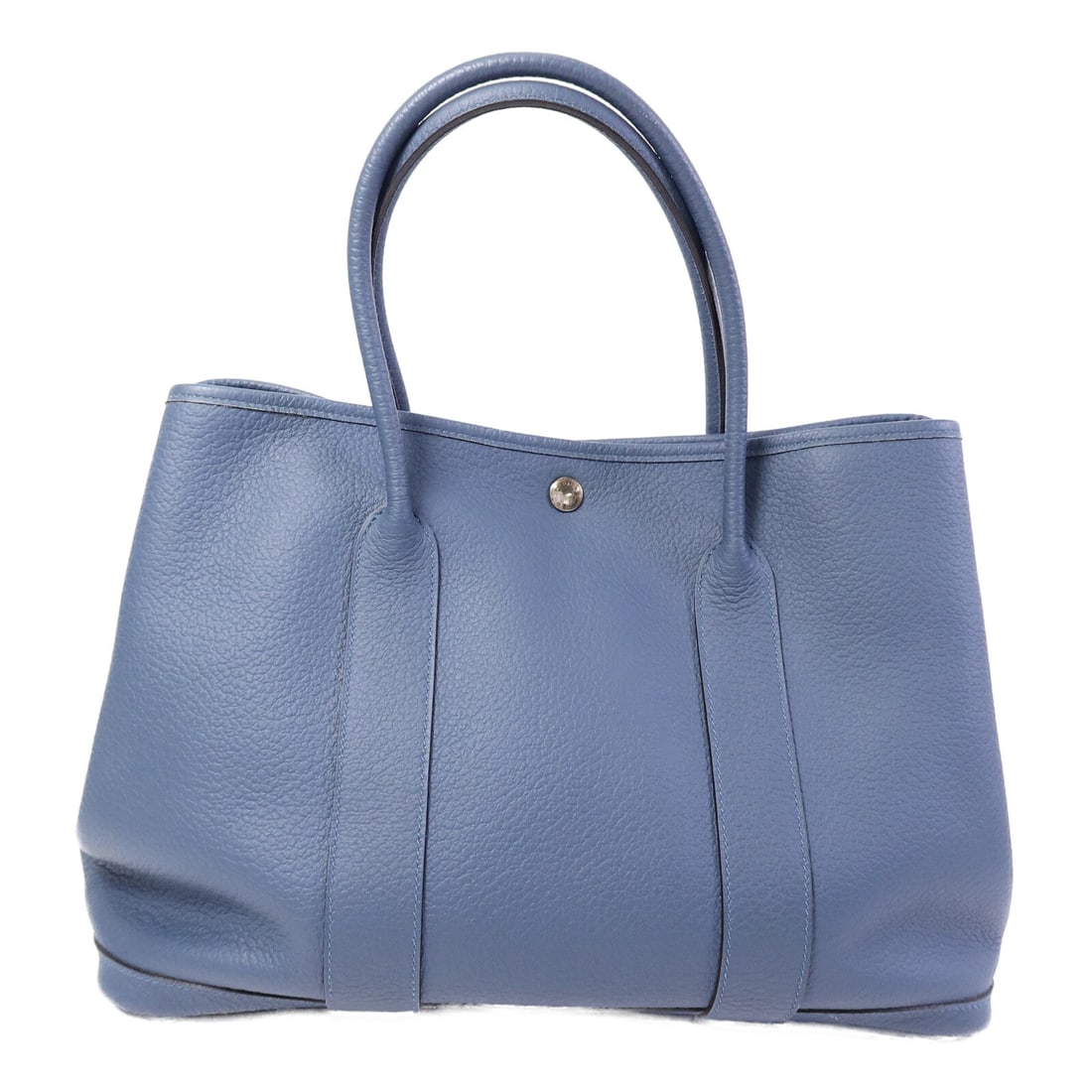 Hermes Garden Party PM Bleu Tempete Calfskin Tote: Hermes Garden Party PM Bleu Tempete Calfskin Tote This Hermes Garden Party PM handbag is crafted from high-quality calfskin leather in a distinctive Bleu Tempete shade. Designed for women, it features