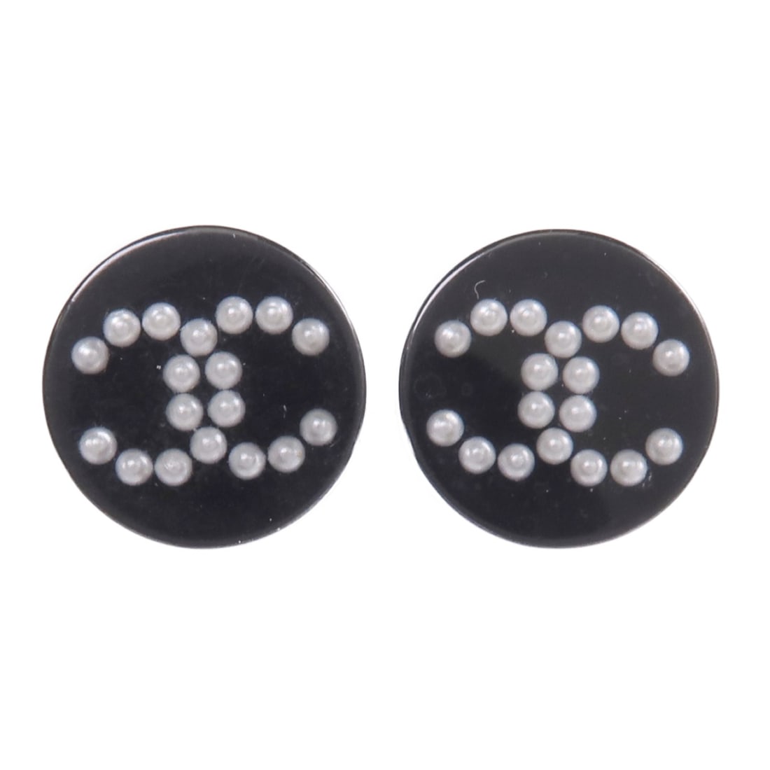 Black PVC Pierced Earrings with CC Logo by Chanel: Black PVC Pierced Earrings with CC Logo by Chanel These CHANEL CC earrings feature a distinctive black PVC design with the iconic CC logo. Crafted for pierced ears, they offer a modern and stylish acc