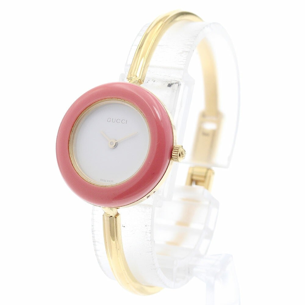 Gucci Change Bezel Quartz Womens Wristwatch 11 12.2 with replacement bezel: Gucci Change Bezel Quartz Womens Wristwatch 11 12.2 with replacement bezel This pre-owned GUCCI 11/12.2 Changeable Bezel quartz wristwatch is designed for women and features a white dial. The watch is