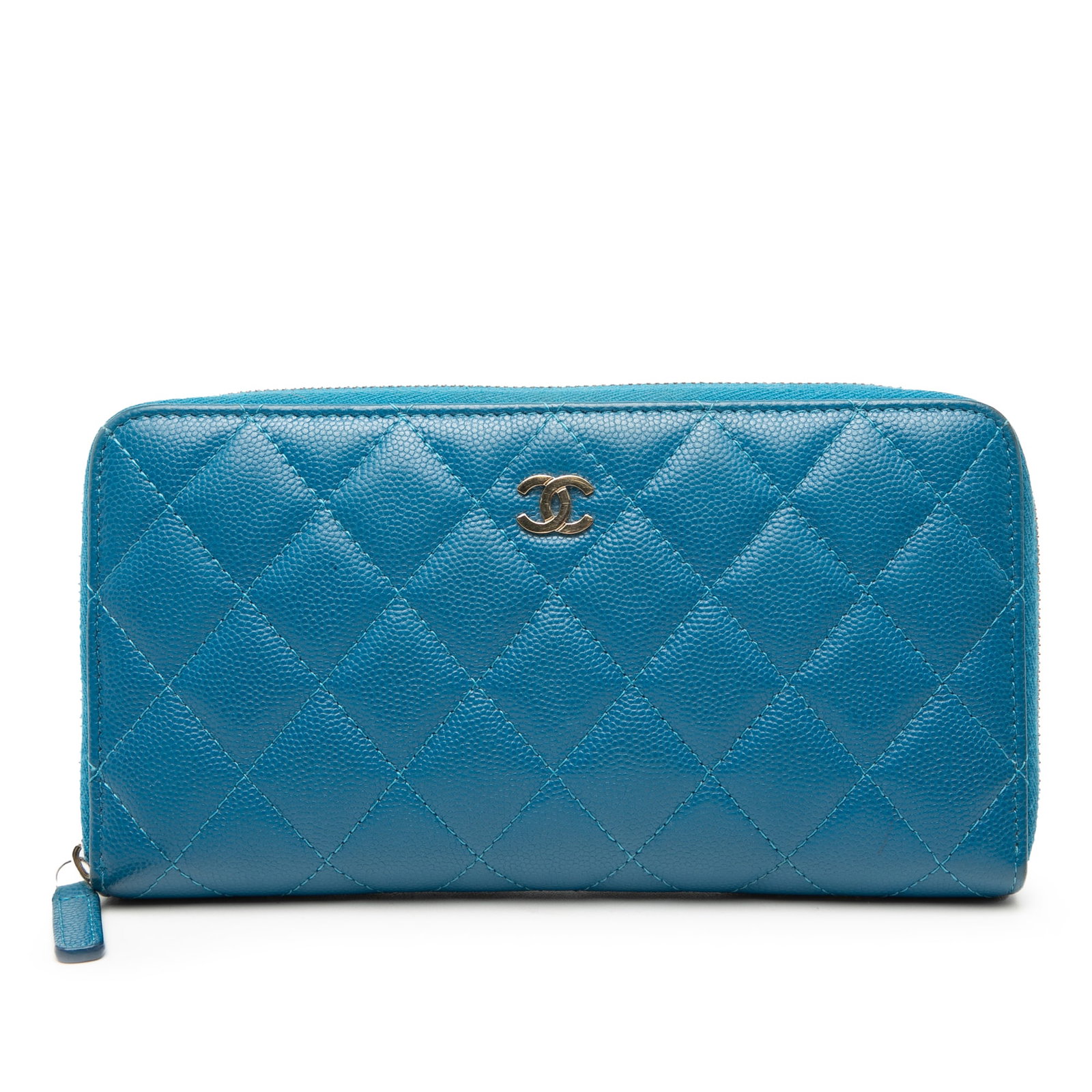 Chanel Blue Caviar Leather Quilted Zip Around Long Wallet: Chanel Blue Caviar Leather Quilted Zip Around Long Wallet This Chanel CC Quilted Caviar Zip Around Long Wallet features a blue quilted caviar leather exterior with a zip-around closure. The interior i