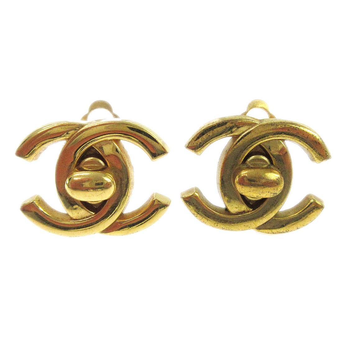 Chanel Gold CC Turnlock Clip-On Earrings 95A: Chanel Gold CC Turnlock Clip-On Earrings 95A These elegant Chanel CC Turnlock Earrings are a stunning addition to any jewelry collection. Featuring a classic clip-on closure, these small earrings show
