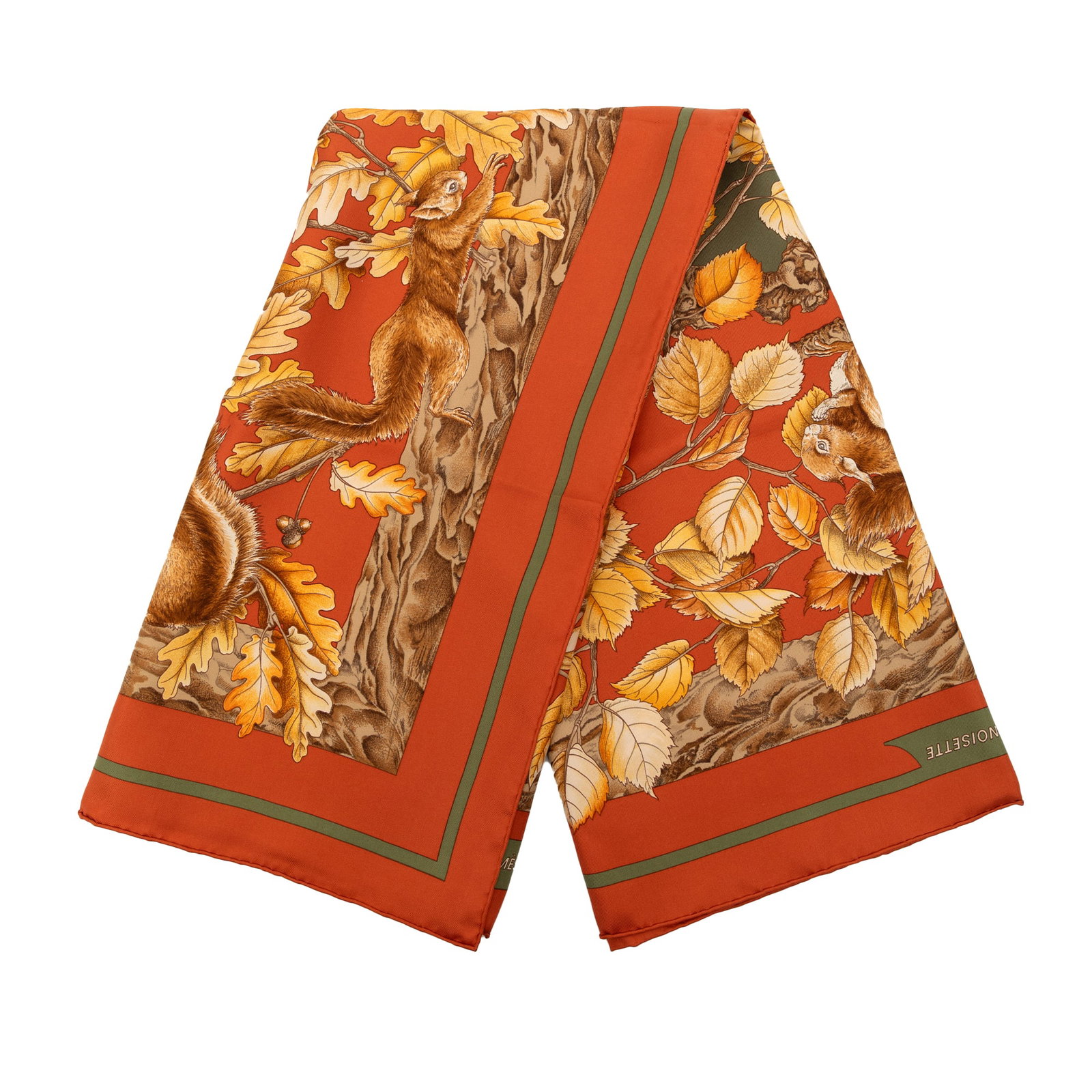 Hermes Casse Noisette 90 Orange Silk Scarf from France: Hermes Casse Noisette 90 Orange Silk Scarf from France This Hermes Casse Noisette Silk Scarf 90 is crafted from 100% silk and features an elegant orange print. Made in France, this accessory offers a 