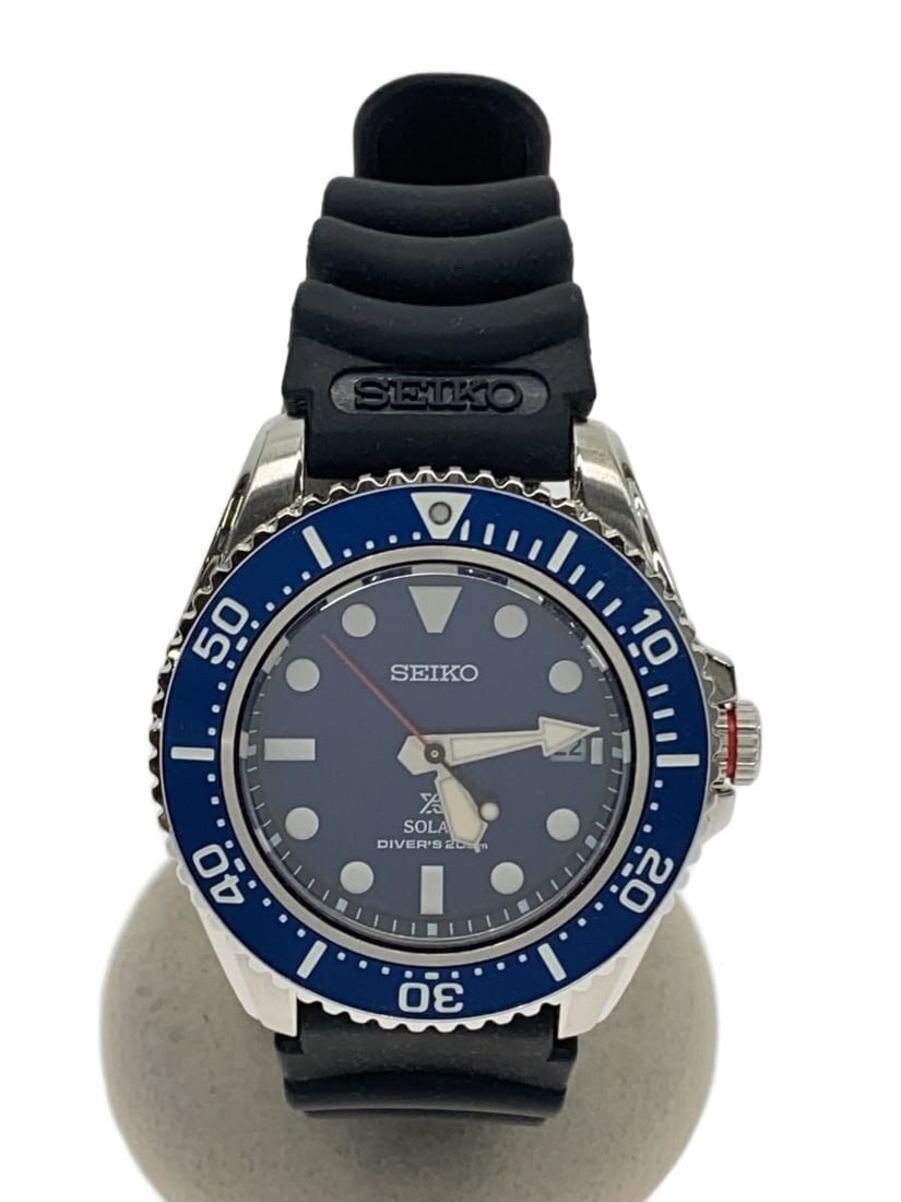 Seiko Prospex Solar 200m Navy Men's Diver Watch: Seiko Prospex Solar 200m Navy Men's Diver Watch This SEIKO PROSPEX V157-0DP0 is a solar-powered diver's watch designed for men. It features a navy case and dial, and is rated for water resistance up t