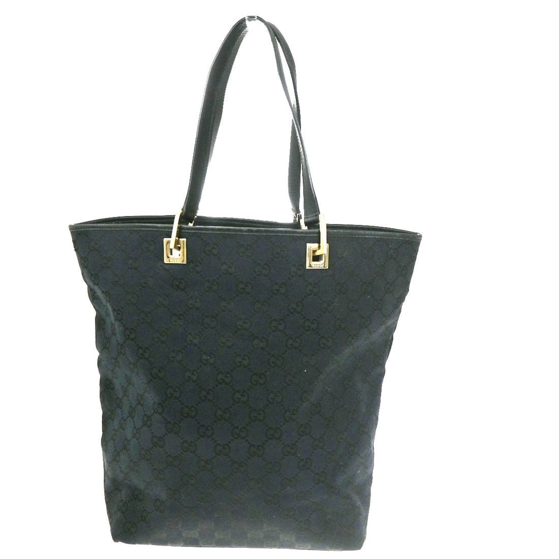 Black Gucci Canvas Bucket Tote Vintage Style 23cm by 30cm by 11cm: Black Gucci Canvas Bucket Tote Vintage Style 23cm by 30cm by 11cm This vintage Gucci bucket shopping tote features the iconic GG canvas in black, designed for women. It showcases a classic shape craft