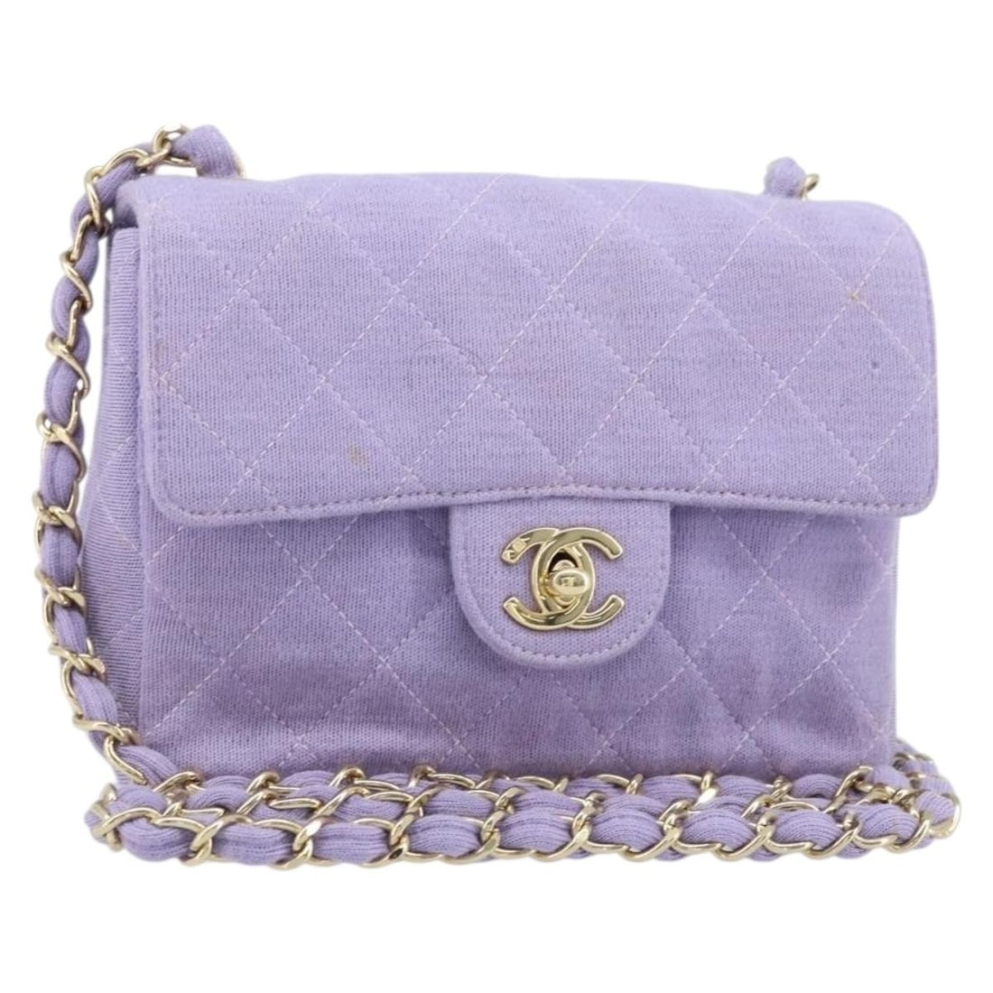 Purple Cotton Square Classic Single Flap Bag by Chanel: Purple Cotton Square Classic Single Flap Bag by Chanel This Chanel Square Classic Single Flap Bag is crafted from cotton in a rich purple shade. Designed for women, it features a compact structure wit