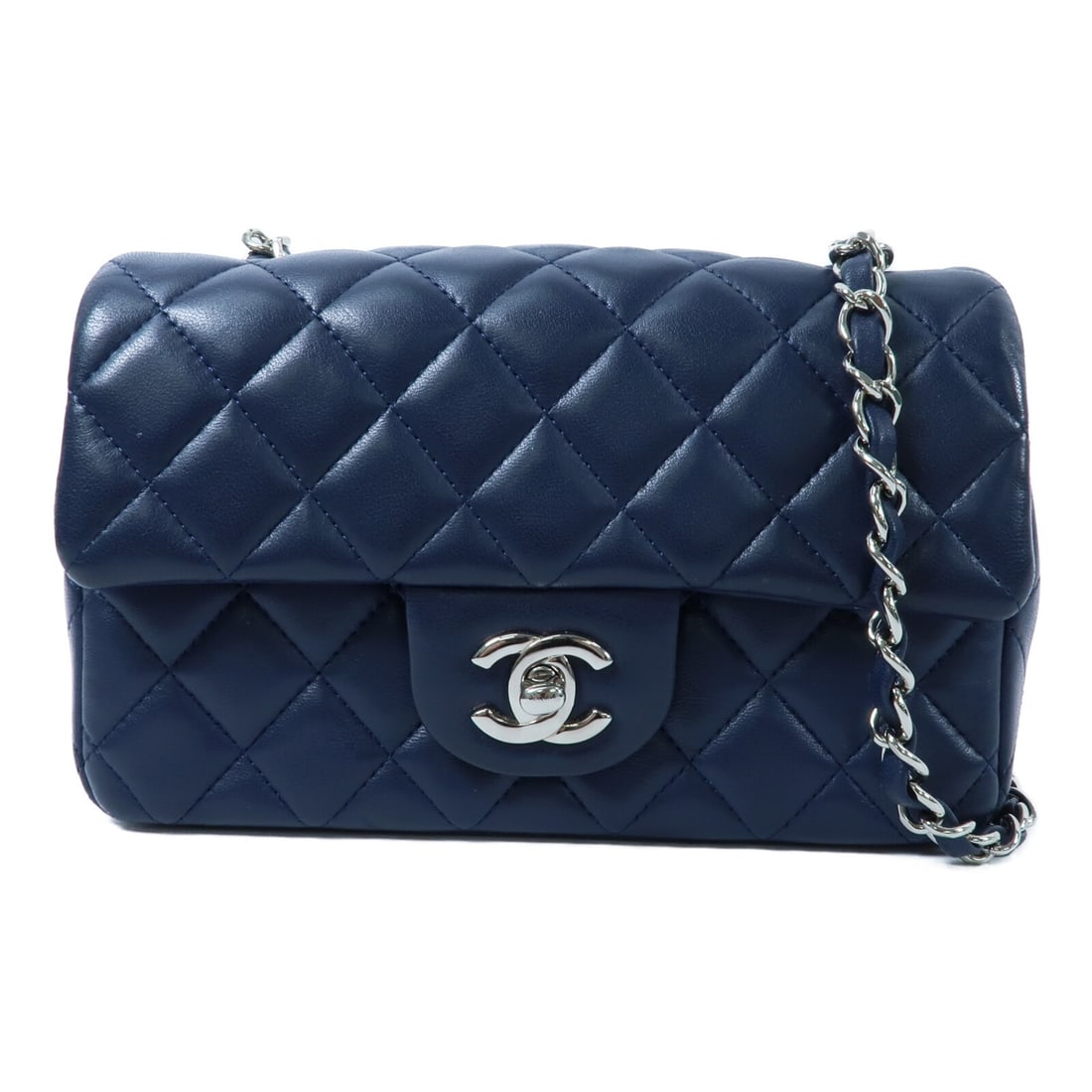 CHANEL Mini Classic CC Shoulder Bag Navy Lambskin: CHANEL Mini Classic CC Shoulder Bag Navy Lambskin This CHANEL Mini Classic 20 chain shoulder bag features elegant navy lambskin leather and signature CC silver hardware. Designed for women, this compa