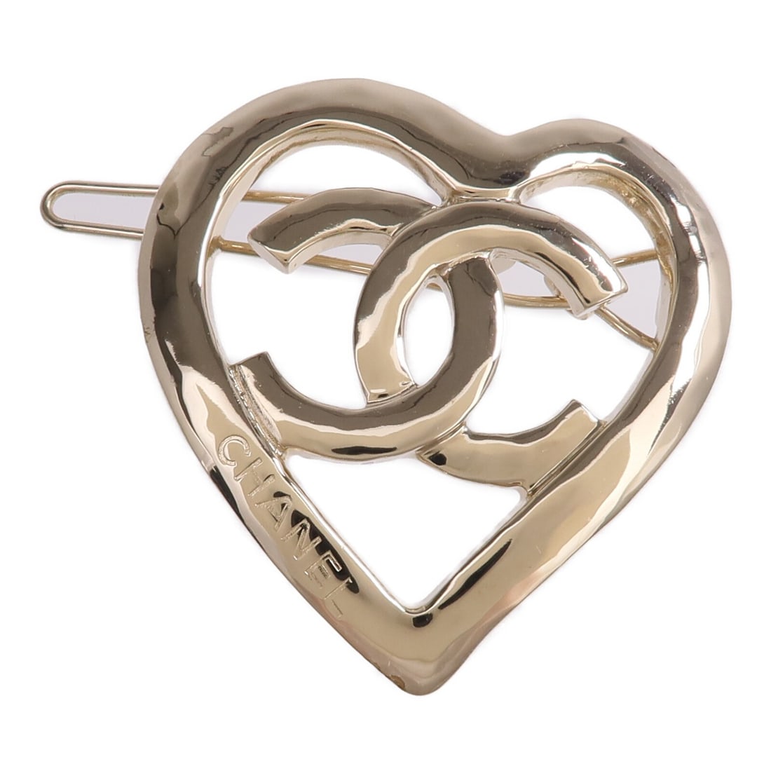 Chanel Valletta Gold Tone Metal Hair Clip for Women: Chanel Valletta Gold Tone Metal Hair Clip for Women This CHANEL Valletta hair clip features a gold-tone metal construction and showcases the iconic CC logo. Designed for women, it is crafted in France