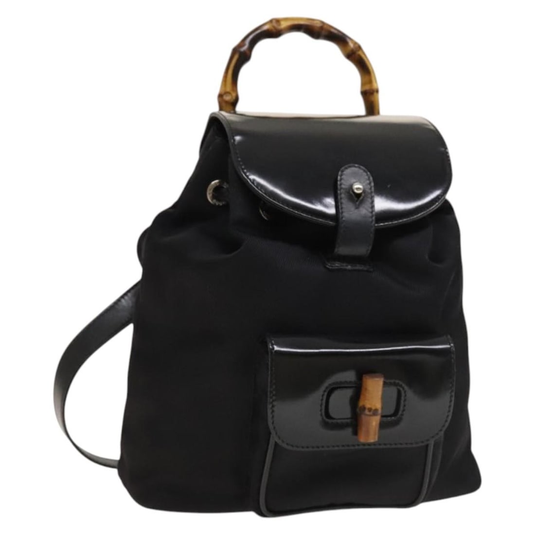 Black Nylon and Patent Leather Gucci Bamboo Backpack: Black Nylon and Patent Leather Gucci Bamboo Backpack This Gucci Vintage Bamboo Backpack features a classic design crafted from black nylon with patent leather accents. Designed for women, it offers a 