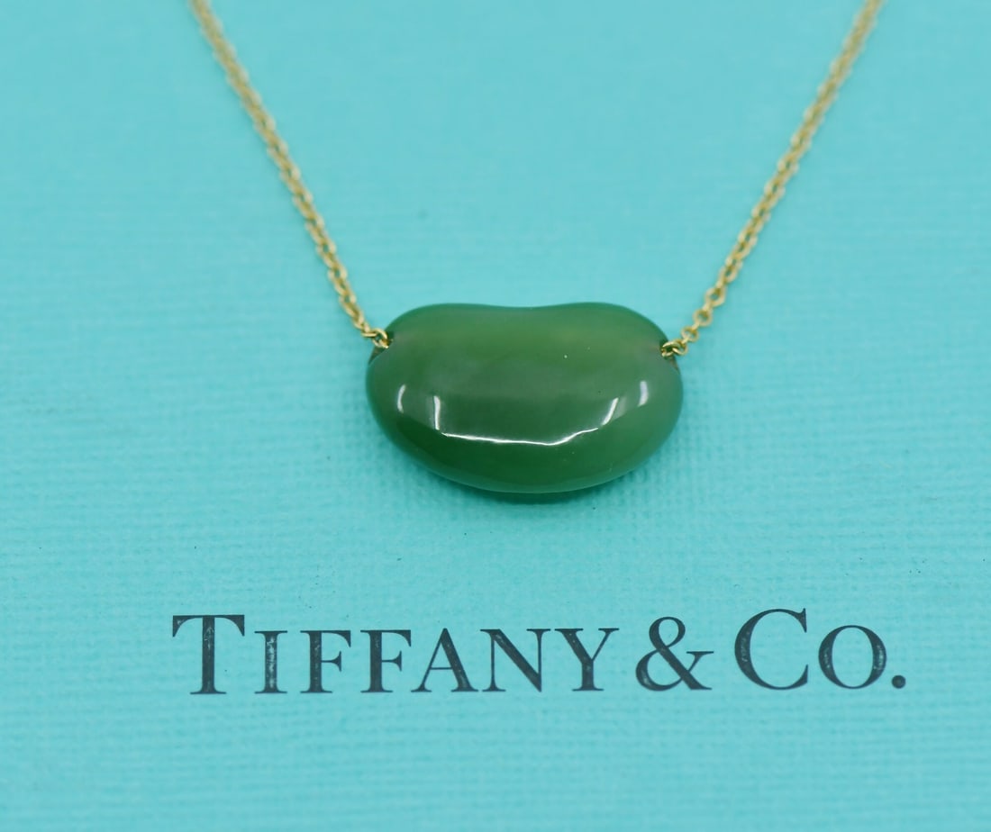 Elsa Peretti Jade Pendant Necklace 18K Yellow Gold Tiffany & Co: Elsa Peretti Jade Pendant Necklace 18K Yellow Gold Tiffany & Co This Tiffany & Co. Elsa Peretti necklace features a jade pendant set in 18K yellow gold. Designed as part of the Elsa Peretti collection