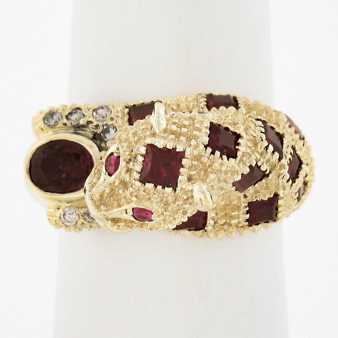 14k Yellow Gold 1.60ctw Ruby Diamond Leopard Cocktail Ring: 14k Yellow Gold 1.60ctw Ruby Diamond Leopard Cocktail Ring Elevate your jewelry collection with this stunning 14k Yellow Gold Cocktail Ring featuring a unique 3D Textured Spotted Leopard design. The r