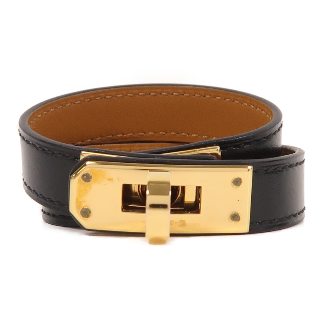 HERMES Kelly Double Tour Black Leather Bracelet: HERMES Kelly Double Tour Black Leather Bracelet This exquisite HERMES Kelly Double Tour Bracelet is crafted from high-quality box calf leather in a classic black color, making it a timeless accessory.