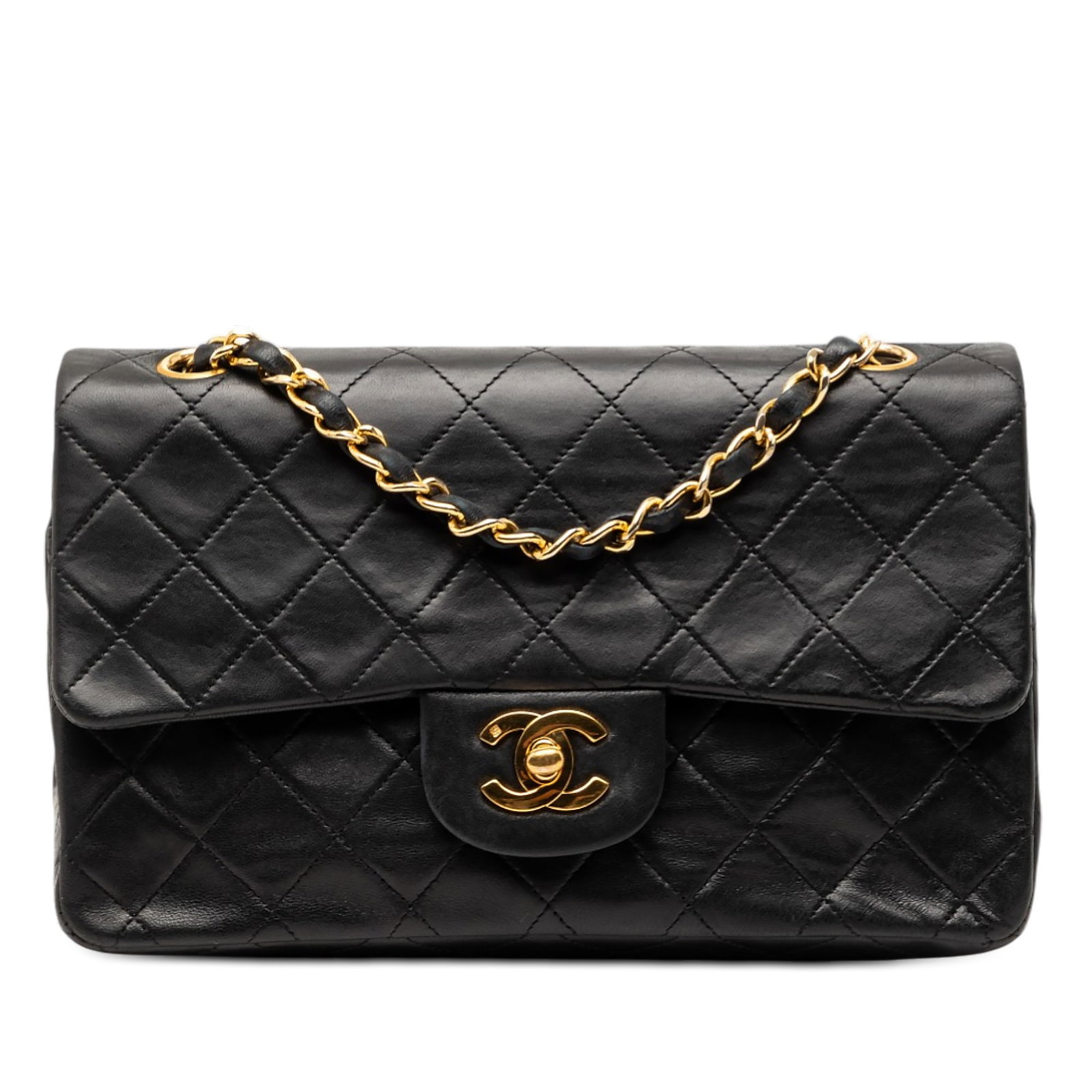 Black Lambskin Small Double Flap Shoulder Bag by Chanel: Black Lambskin Small Double Flap Shoulder Bag by Chanel This Chanel Small Classic Double Flap shoulder bag is crafted from quilted black lambskin leather and features leather-woven chain shoulder stra