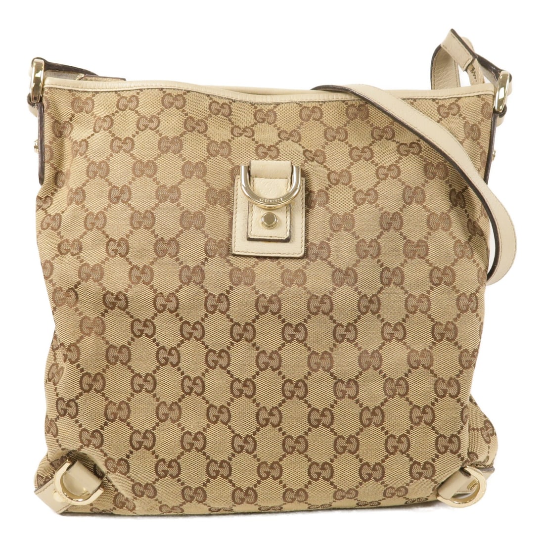 Brown Canvas Gucci GG Shoulder Bag with Gold Tone Hardware: Brown Canvas Gucci GG Shoulder Bag with Gold Tone Hardware This GUCCI GG shoulder bag features a brown canvas exterior and is designed for women. The bag showcases a classic shoulder style and is craf