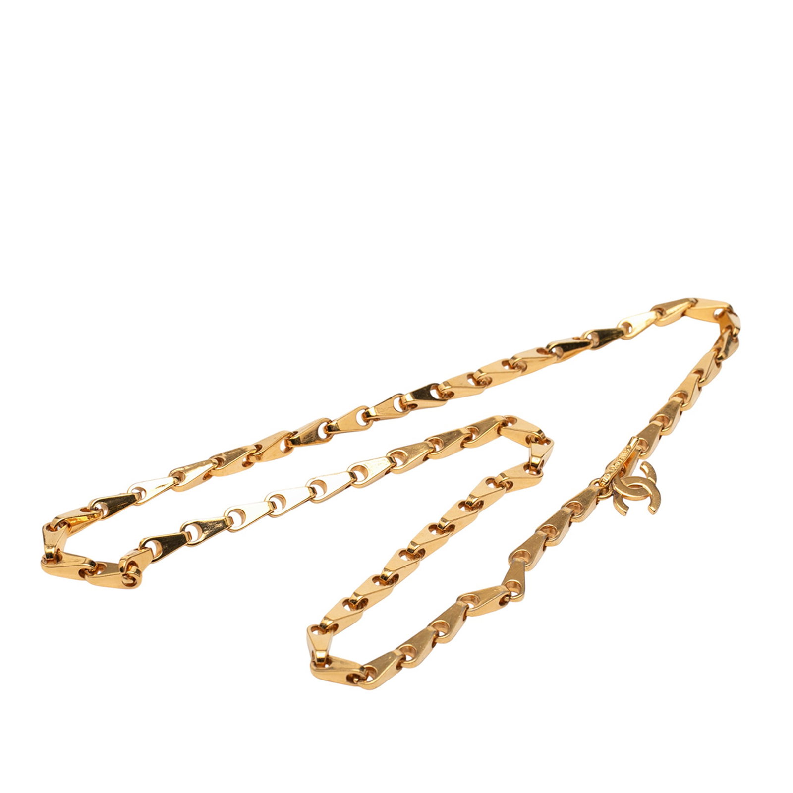 Chanel CC Logo Pendant Necklace in Gold Tone Metal: Chanel CC Logo Pendant Necklace in Gold Tone Metal This Chanel necklace features a gold tone metal body with a CC pendant and a metal clasp closure. The piece is categorized as costume jewelry and is 