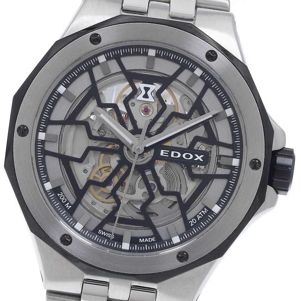 Edox Delfin Meccano Automatic Men's Stainless Steel Watch 85303: Edox Delfin Meccano Automatic Men's Stainless Steel Watch 85303 This EDOX Delfin Mechano men's wristwatch features a stainless steel case and bracelet with a skeleton dial, showcasing its automatic mo
