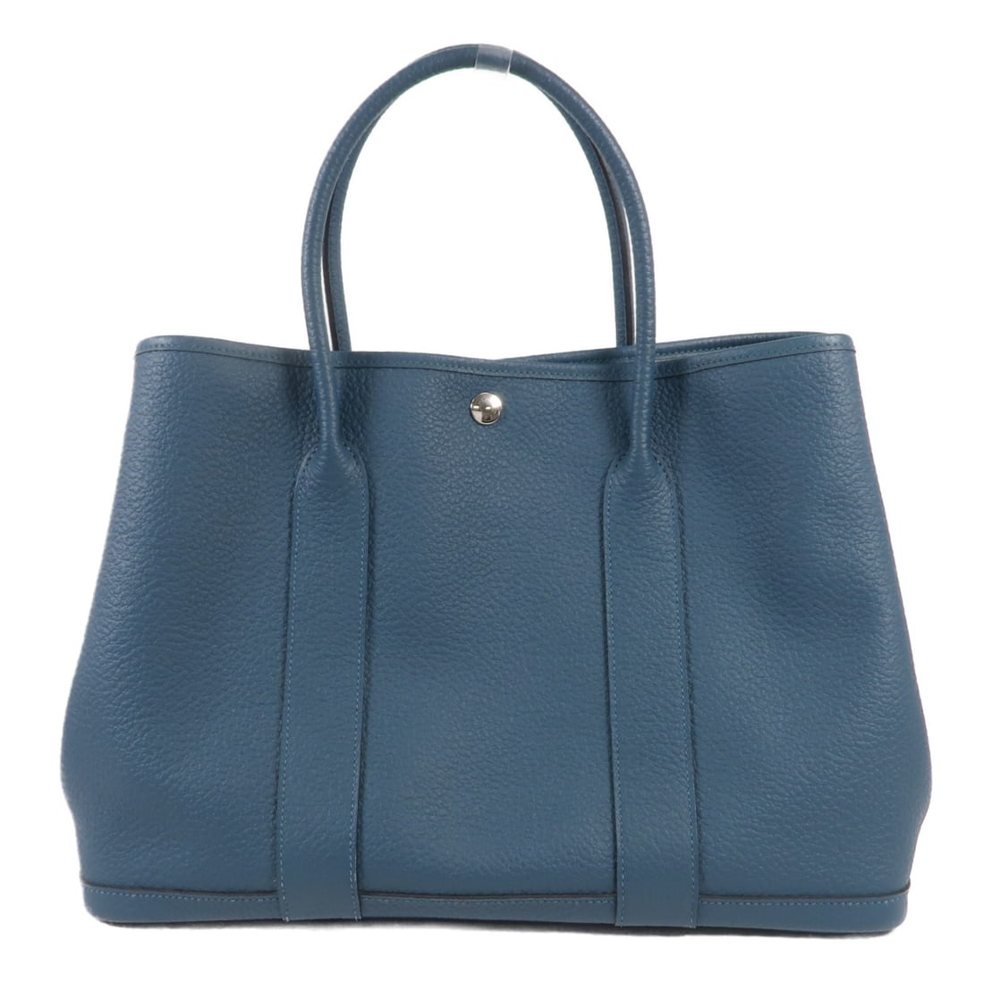HERMES Garden Party PM Tote Bag Blue de Presse Calfskin: HERMES Garden Party PM Tote Bag Blue de Presse Calfskin Presenting the exquisite HERMES Garden Party PM Tote Bag, meticulously crafted from premium calfskin leather in a stunning blue hue. This elegan