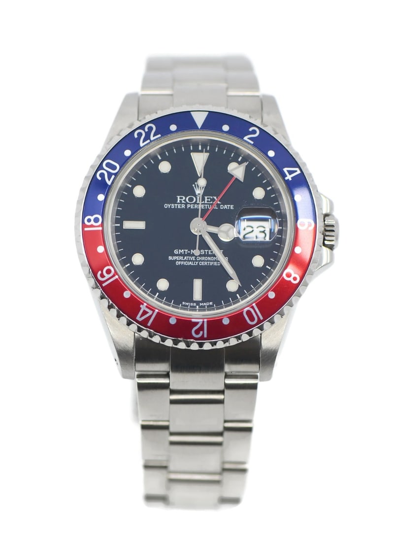 Rolex GMT Master II 16710 Stainless Steel Black Dial 40 mm Box: Rolex GMT Master II 16710 Stainless Steel Black Dial 40 mm Box This Rolex GMT-Master II Pepsi features a stainless steel case and band, a black analog dial, and a 40 mm case size. The watch is powered