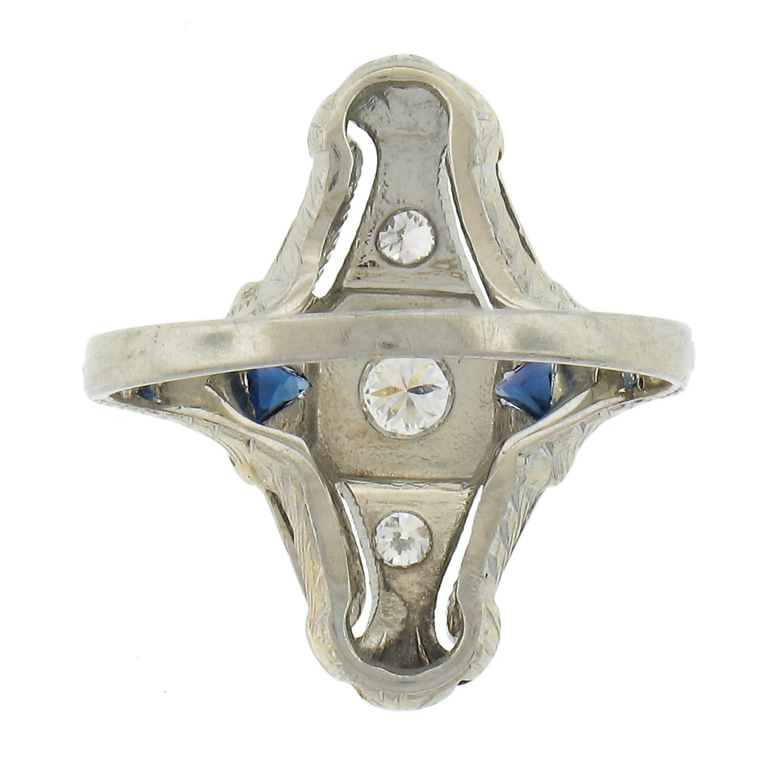 Art Deco Navette Ring 18K White Gold with Diamonds and Blue Sapphires: Art Deco Navette Ring 18K White Gold with Diamonds and Blue Sapphires This antique Art Deco navette ring features a solid 18K white gold setting adorned with three natural old cut diamonds and two syn