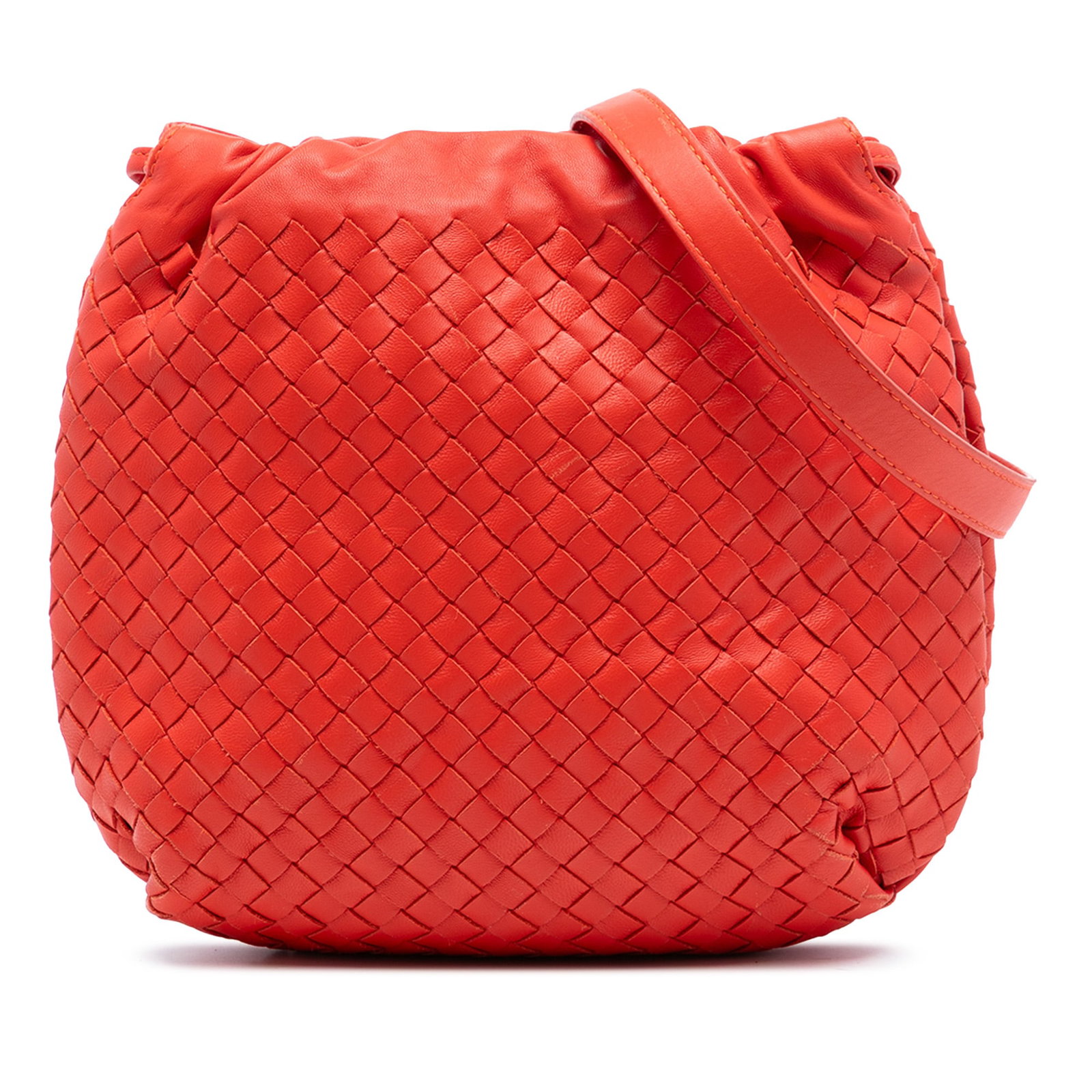 Orange Nappa Leather Intrecciato Drawstring Crossbody Bag by Bottega Veneta: Orange Nappa Leather Intrecciato Drawstring Crossbody Bag by Bottega Veneta This Bottega Veneta Nappa Intrecciato Drawstring Crossbody bag features a woven nappa leather body in orange, an adjustable