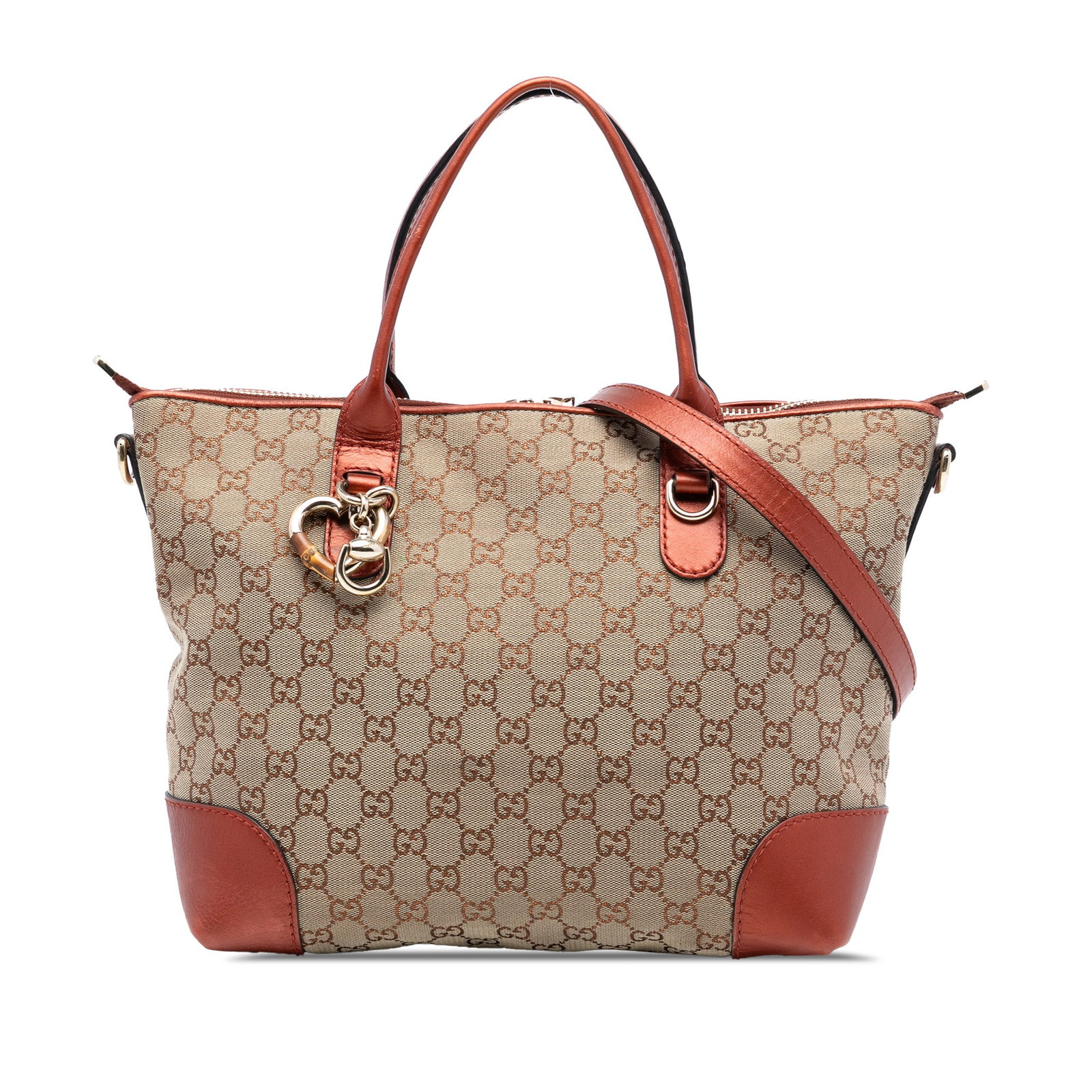 Gucci GG Canvas Satchel with Heart Bit Accent and Leather Trim: Gucci GG Canvas Satchel with Heart Bit Accent and Leather Trim The Gucci GG Canvas Heart Bit Satchel features a beige canvas body with leather trim, flat leather handles, a top zip closure, and interi