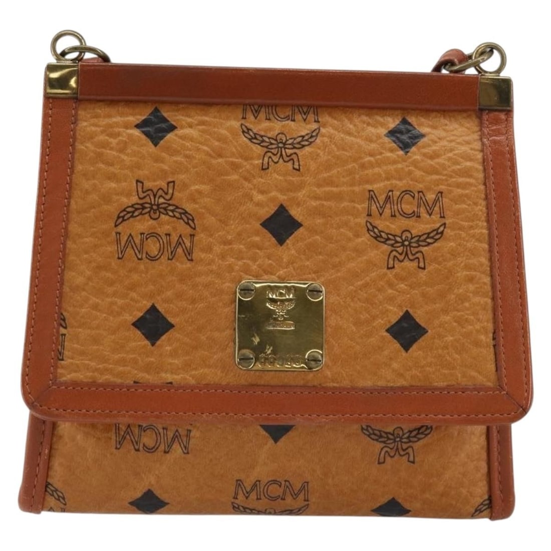 Brown Canvas and Leather Shoulder Bag by MCM Visetos: Brown Canvas and Leather Shoulder Bag by MCM Visetos This MCM Visetos shoulder bag is designed for women, crafted from brown canvas with leather accents. The bag measures 15cm x 14cm x 5cm and feature