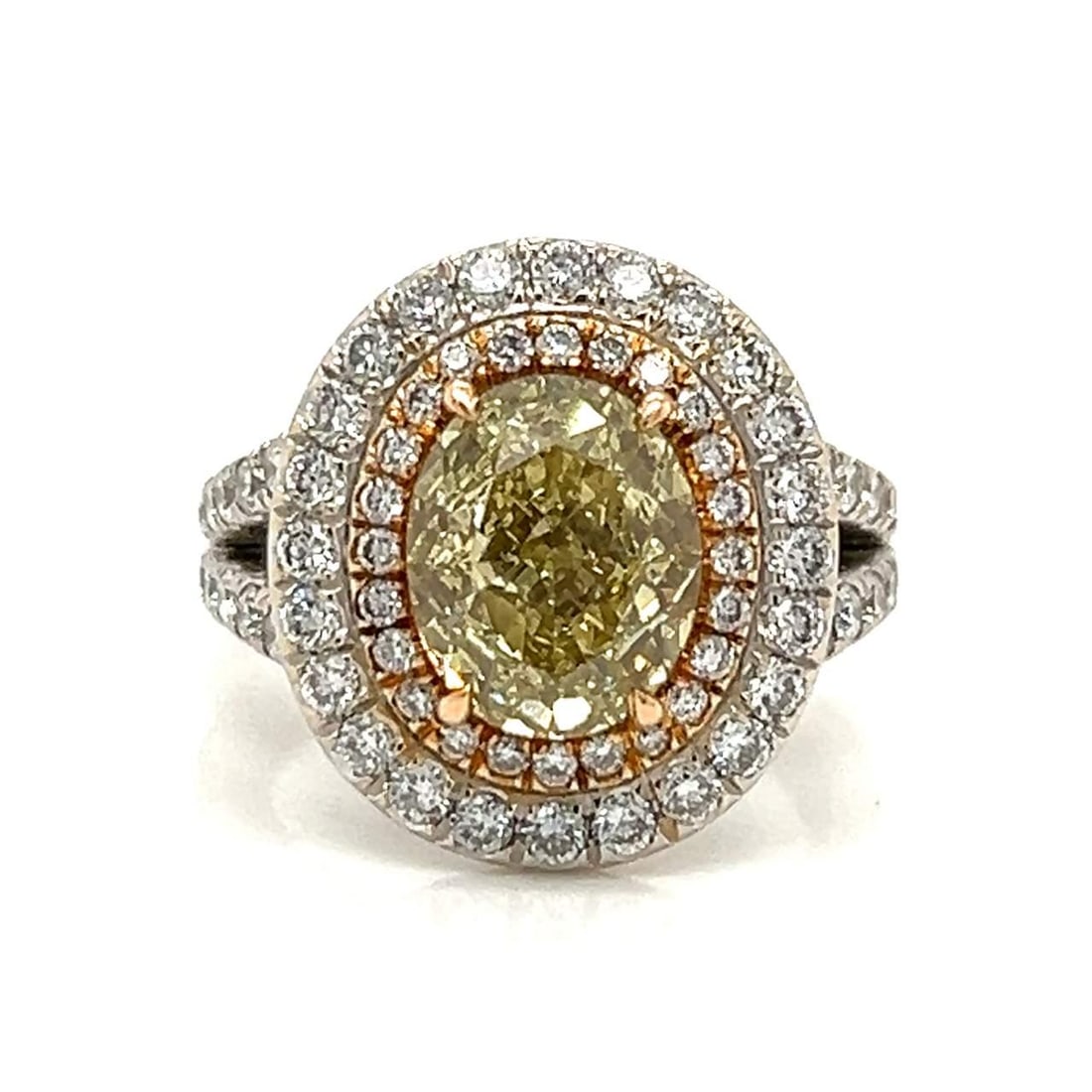 18K Gold 2.54 Ct GIA Certified Fancy Diamond Engagement Ring: 18K Gold 2.54 Ct GIA Certified Fancy Diamond Engagement Ring This exquisite engagement ring features a stunning 2.54 Ct. GIA Certified Oval Diamond, showcasing a natural fancy brownish greenish yellow