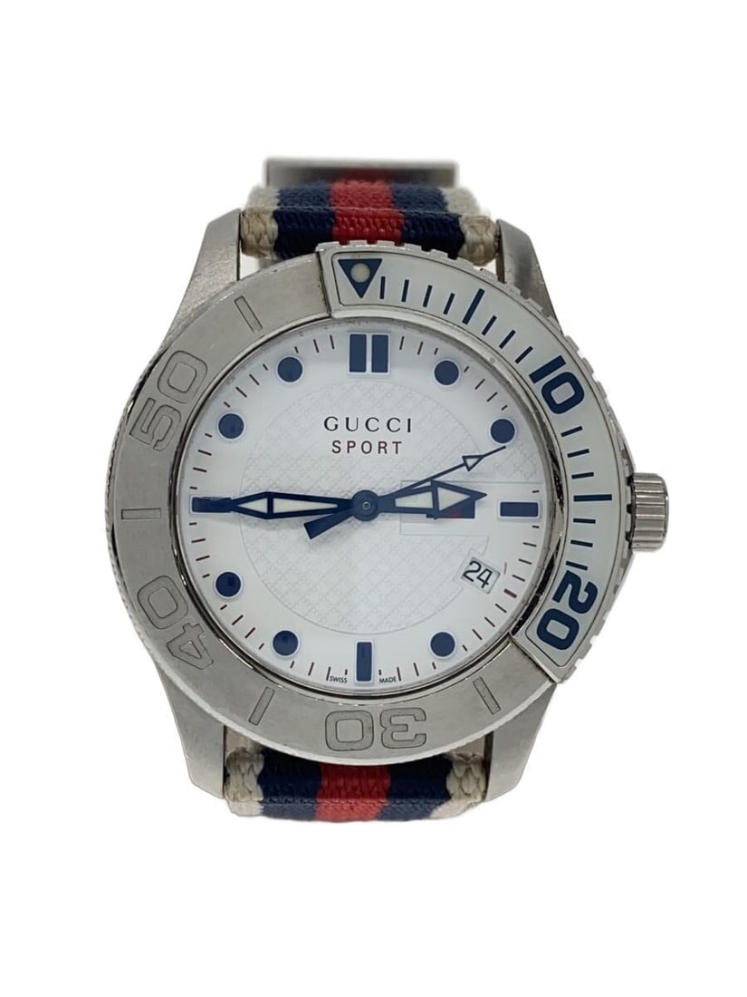 Gucci G Timeless Sport Quartz Men's Canvas Wristwatch: Gucci G Timeless Sport Quartz Men's Canvas Wristwatch This is a pre-owned GUCCI G-TIMELESS Sport Quartz 126.2 men's wristwatch, crafted in Switzerland. The watch features a white canvas material and d
