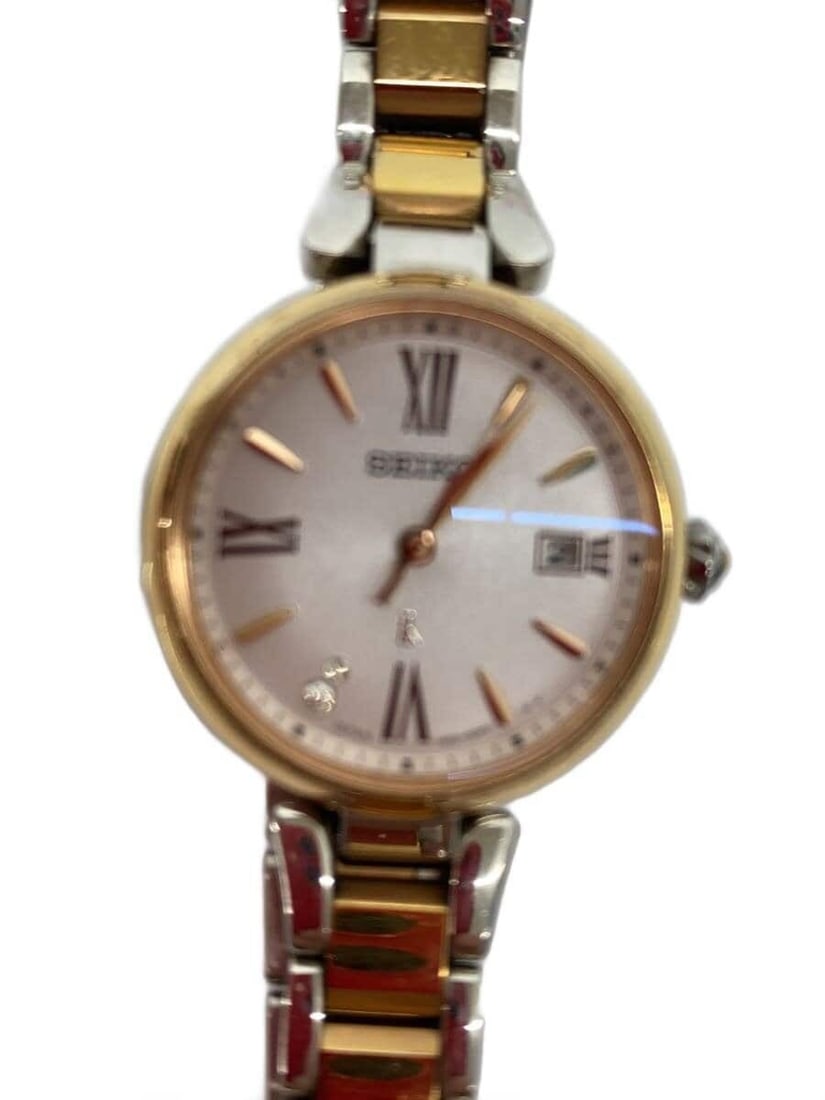 Seiko Lukia Pink Titanium Women's Wristwatch 1B32-0BK0: Seiko Lukia Pink Titanium Women's Wristwatch 1B32-0BK0 This SEIKO LUKIA 1B32-0BK0 women's wristwatch features a pink dial and a durable titanium case. Designed for everyday wear, it offers a lightweig