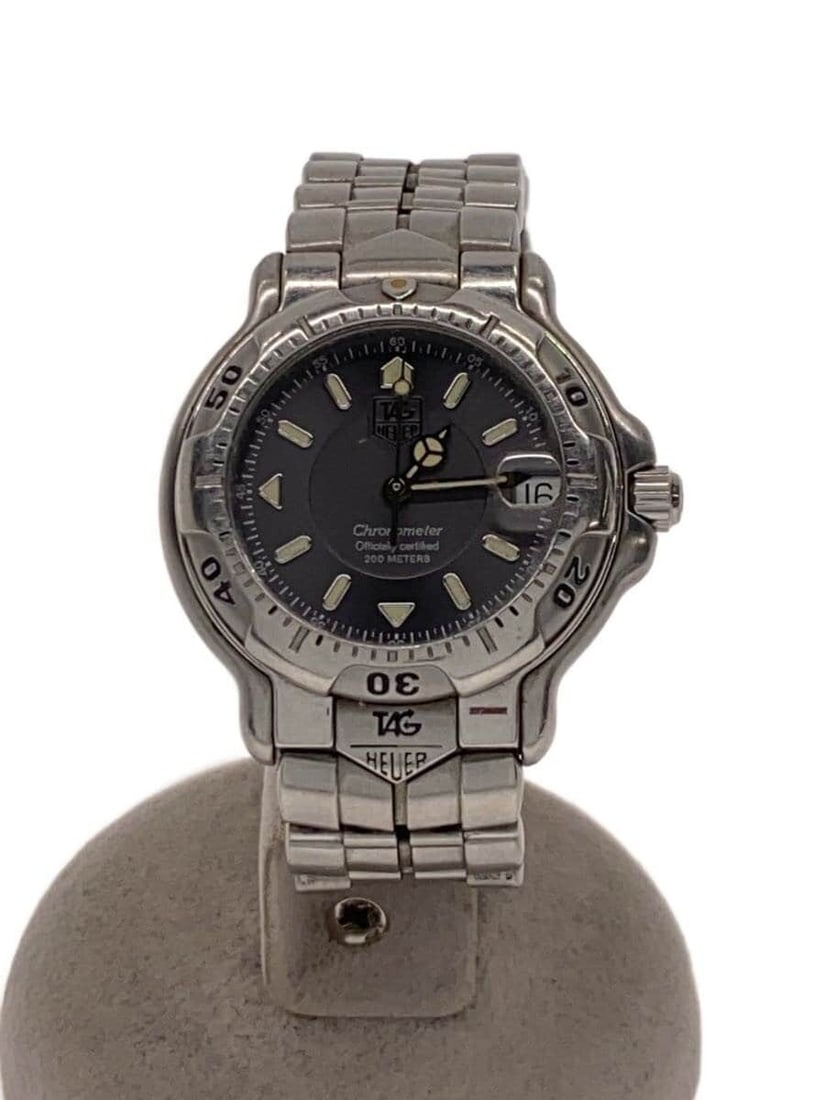 TAG Heuer 6000 Series Stainless Steel Men's Wristwatch WH5212 K1: TAG Heuer 6000 Series Stainless Steel Men's Wristwatch WH5212 K1 This TAG Heuer 6000 Series WH5212+K1 men's wristwatch features a silver-tone stainless steel construction and is designed for men. The 
