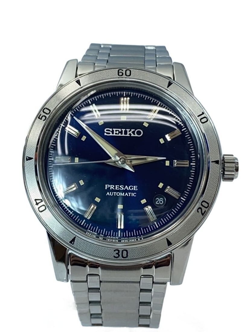 Seiko Presage Style 60s Navy Mechanical Wristwatch: Seiko Presage Style 60s Navy Mechanical Wristwatch This SEIKO Presage Style 60's Mechanical wristwatch features a navy dial and classic design inspired by the 1960s. The watch is powered by a mechanic