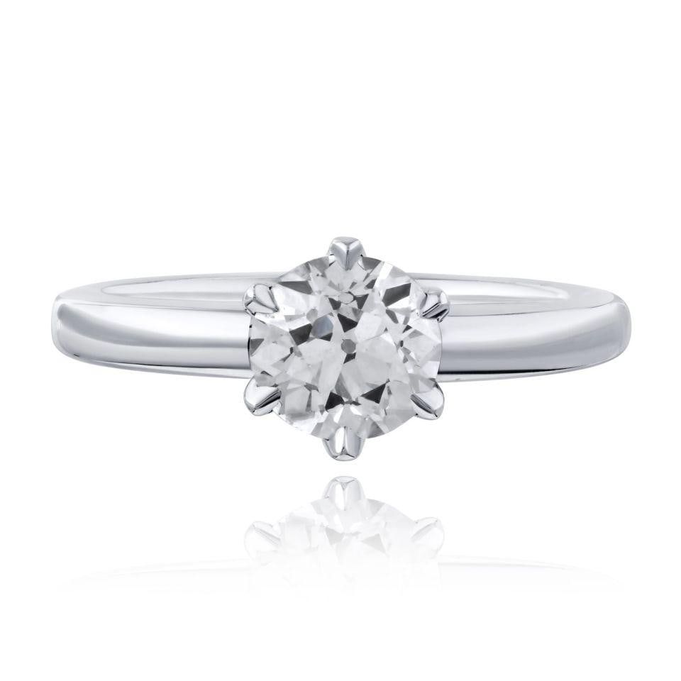 Old European Cut 1.29ct J VS2 Diamond Ring in 14K White Gold: Old European Cut 1.29ct J VS2 Diamond Ring in 14K White Gold This pre-owned ring features a 1.29 carat Old European cut diamond graded J color and VS2 clarity, set in 14K white gold. The ring is size 