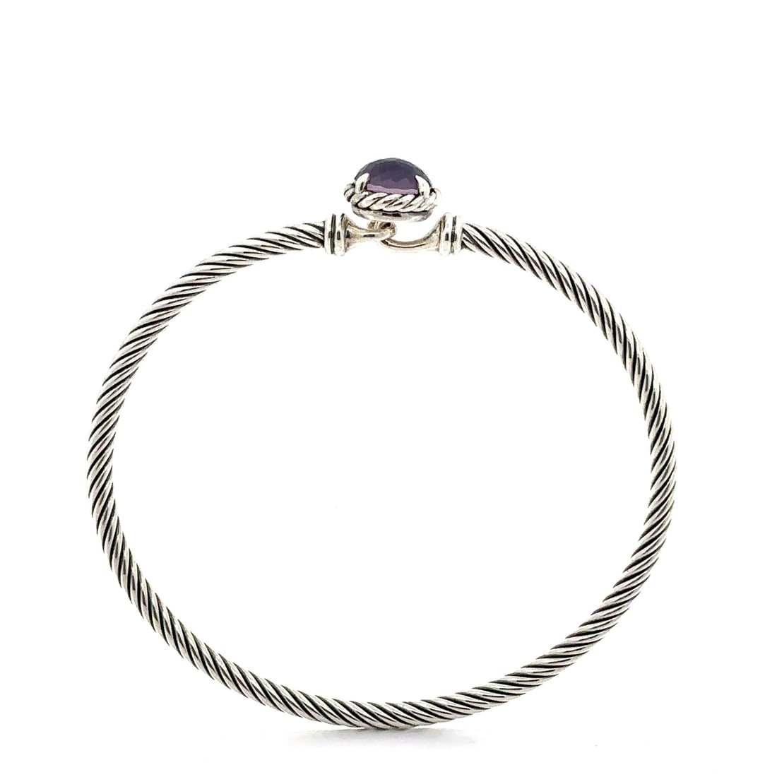 David Yurman Silver Cable Bangle Bracelet with Natural Iolite: David Yurman Silver Cable Bangle Bracelet with Natural Iolite This exquisite David Yurman bangle bracelet features a striking design with a natural, round faceted Iolite gemstone prong set in solid st