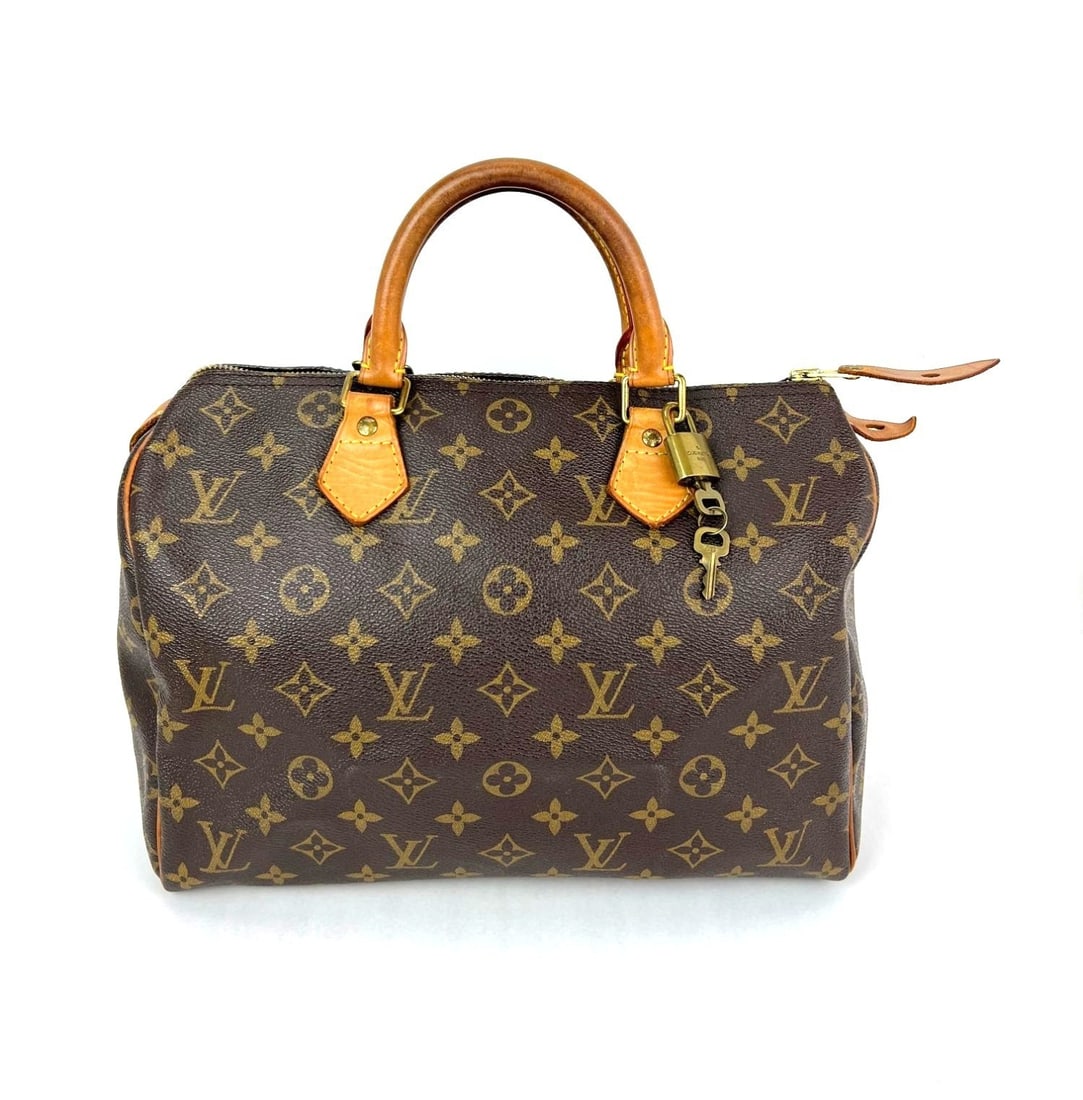 Louis Vuitton Speedy 30 Monogram Satchel Brown Zip Top Handle Bag: Louis Vuitton Speedy 30 Monogram Satchel Brown Zip Top Handle Bag This Louis Vuitton Monogram Speedy 30 is a vintage satchel-style handbag crafted from coated leather canvas with the iconic monogram p