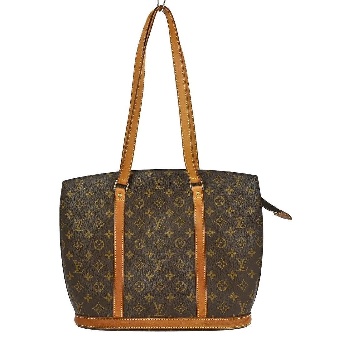Louis Vuitton Babylone Monogram Canvas Large Tote Bag with Double Handles: Louis Vuitton Babylone Monogram Canvas Large Tote Bag with Double Handles The Louis Vuitton Babylone tote bag features the iconic Monogram canvas leather exterior with beige double leather handles. Th