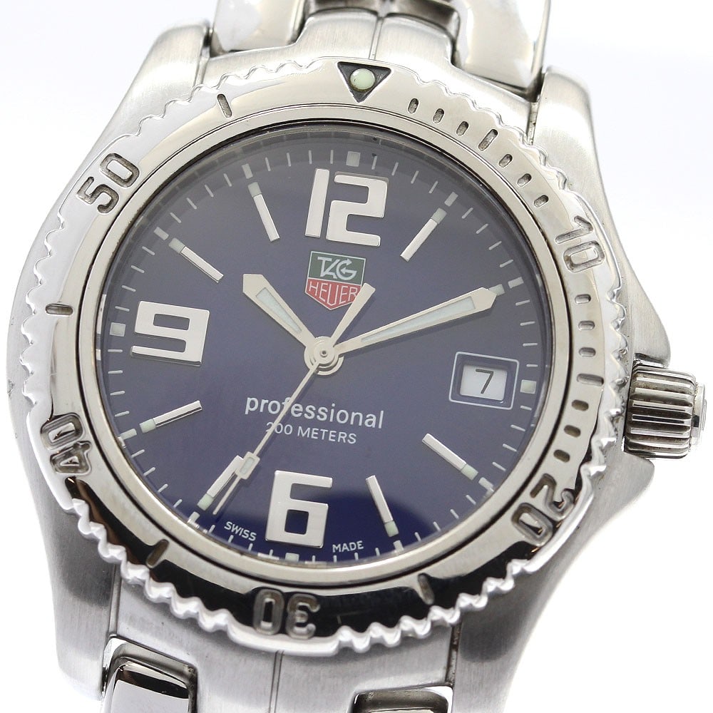 TAG Heuer Link WT1213 Blue Dial Quartz Date Watch: TAG Heuer Link WT1213 Blue Dial Quartz Date Watch This TAG HEUER Link Date Quartz wristwatch offers a classic and versatile design suitable for unisex wear. Featuring a blue dial set in a stainless st