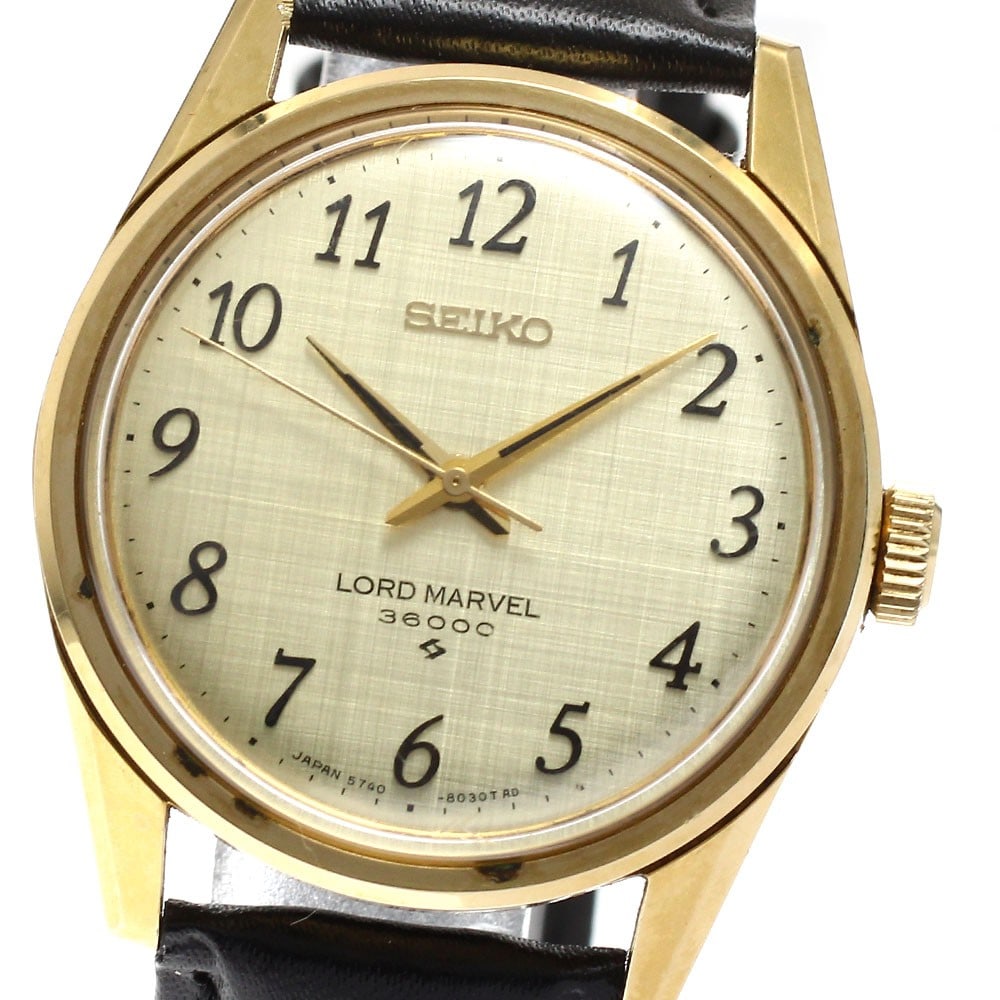 Seiko Lord Marvel 36000 manual wind men's wristwatch 5740-8000: Seiko Lord Marvel 36000 manual wind men's wristwatch 5740-8000 This Seiko Lord Marvel 36000 men's wristwatch, model 5740-8000, features a manual-winding 5740C caliber movement. The watch has a gold di
