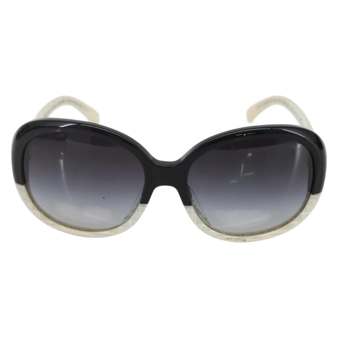 Black Plastic Sunglasses with Chanel Logo for Women: Black Plastic Sunglasses with Chanel Logo for Women Chanel logo sunglasses designed for women featuring black plastic frames. These sunglasses measure 13.5 cm in width and 5 cm in height. Made in Ital