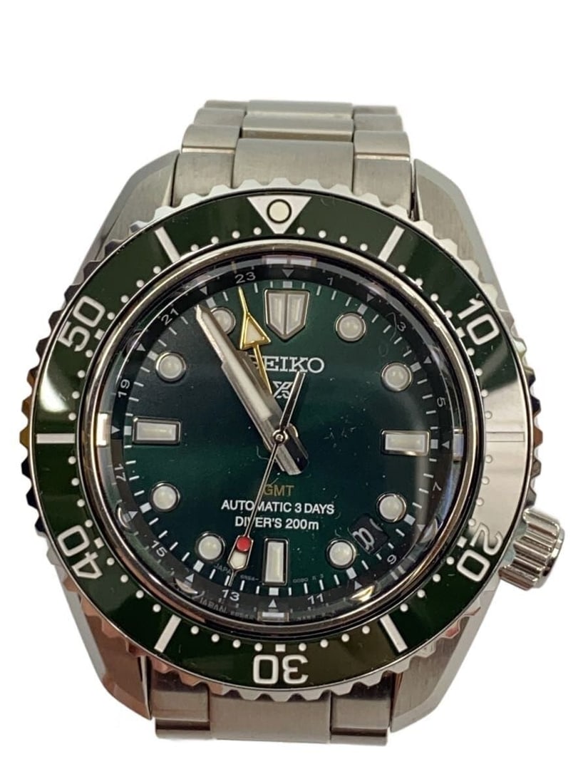 Seiko Prospex automatic GMT diver watch green stainless steel: Seiko Prospex automatic GMT diver watch green stainless steel This SEIKO PROSPEX Diver Scuba GMT men's wristwatch features automatic winding and a robust stainless steel construction. The watch showca