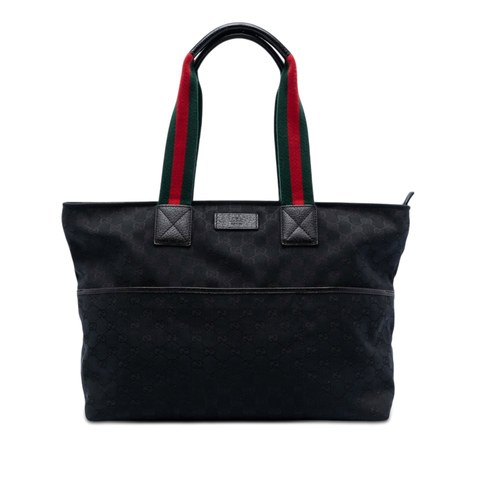 Black GG Canvas Web Shoulder Tote by Gucci with Leather Trim: Black GG Canvas Web Shoulder Tote by Gucci with Leather Trim This Gucci GG Canvas Web Tote features a durable canvas body accented with leather trim, rolled web shoulder straps with leather guards, a 