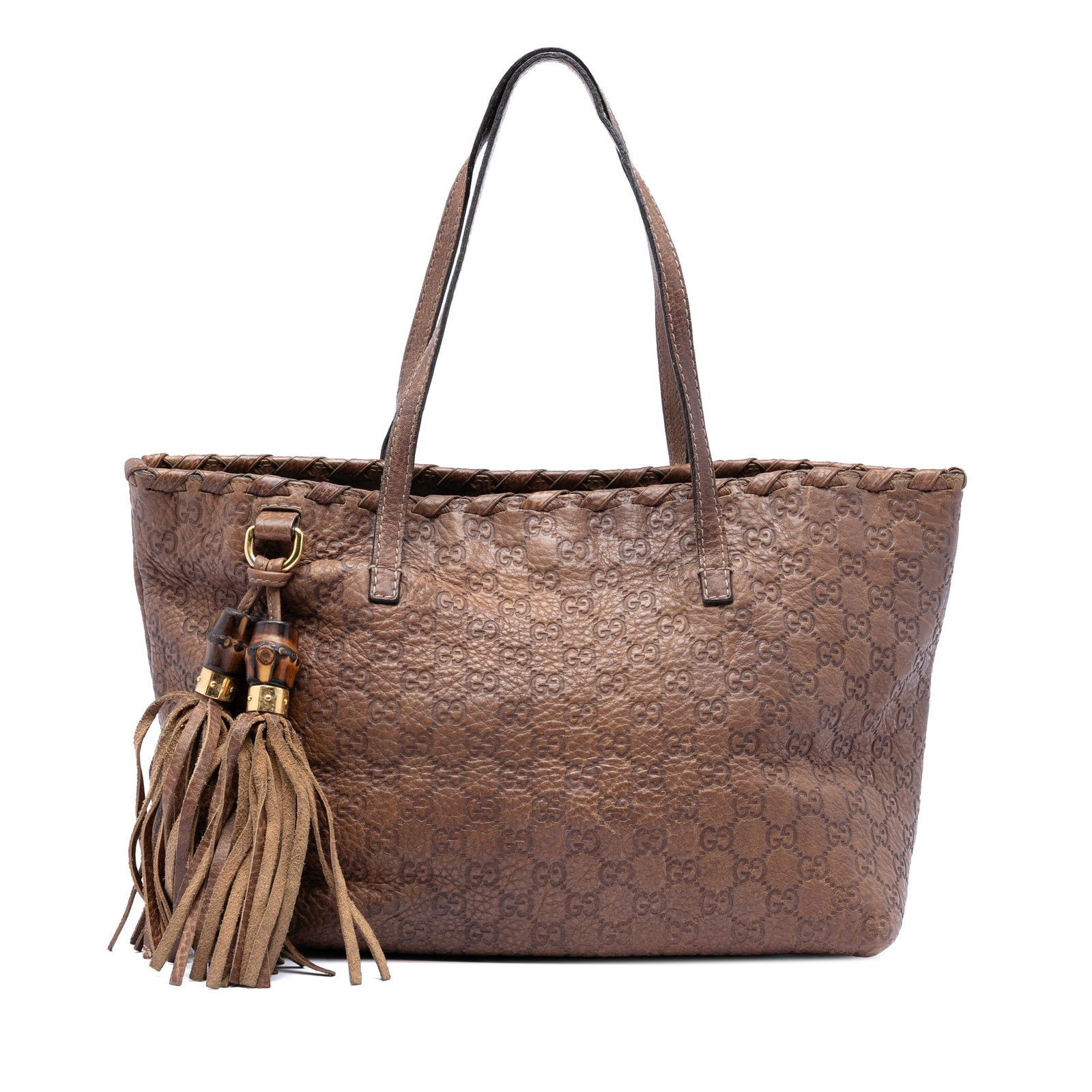 Gucci Guccissima Bamboo Tassel Brown Leather Medium Tote Bag: Gucci Guccissima Bamboo Tassel Brown Leather Medium Tote Bag This Medium Guccissima Bamboo Tassel Tote features embossed leather in brown, flat leather handles, and a decorative tassel with bamboo det