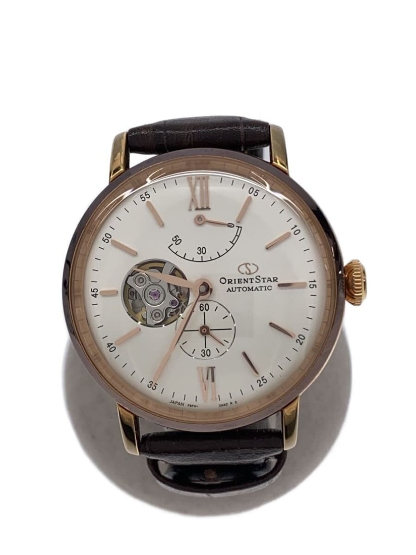 Orient Star F6F4-UAA0 White Dial Rubber Strap Watch: Orient Star F6F4-UAA0 White Dial Rubber Strap Watch This ORIENT STAR Classic Collection F6F4-UAA0 men's wristwatch features a white dial and a durable rubber strap. Made in Japan, the watch is slightl