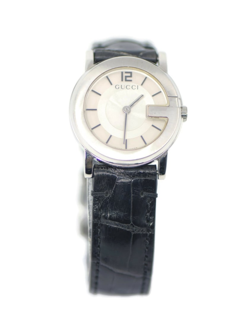 Gucci G Round 101L Stainless Steel Watch YA101506 with Box: Gucci G Round 101L Stainless Steel Watch YA101506 with Box Discover the elegant Gucci G Round 101L Stainless Steel Watch, a perfect blend of style and sophistication. This wristwatch features a classi