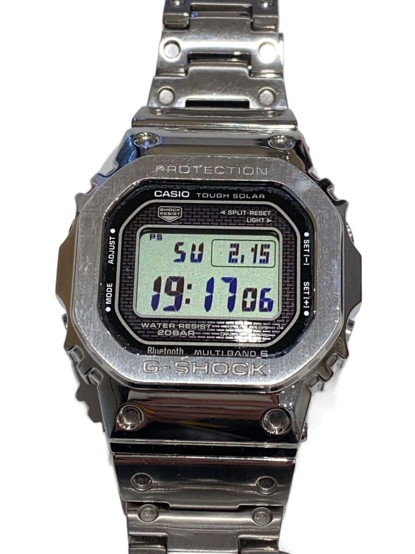 Casio G Shock GMW B5000 Silver Wristwatch: Casio G Shock GMW B5000 Silver Wristwatch This CASIO G-SHOCK GMW-B5000 men's wristwatch features a silver finish and is crafted in Japan. The watch shows slight signs of use and is in pre-owned condit